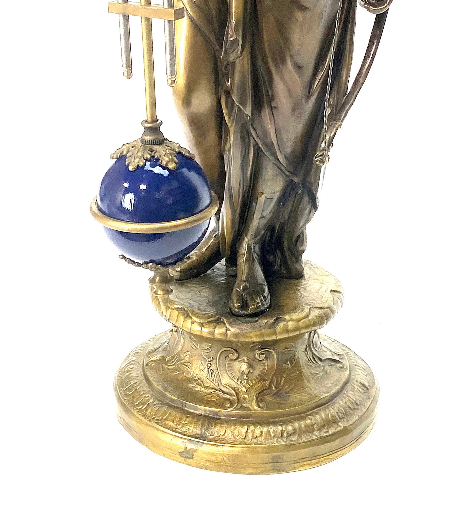 Large Mystery Brass Lady Diana 8 Day Cobalt Blue Ball Swinging Clock In Excellent Condition For Sale In Danville, CA