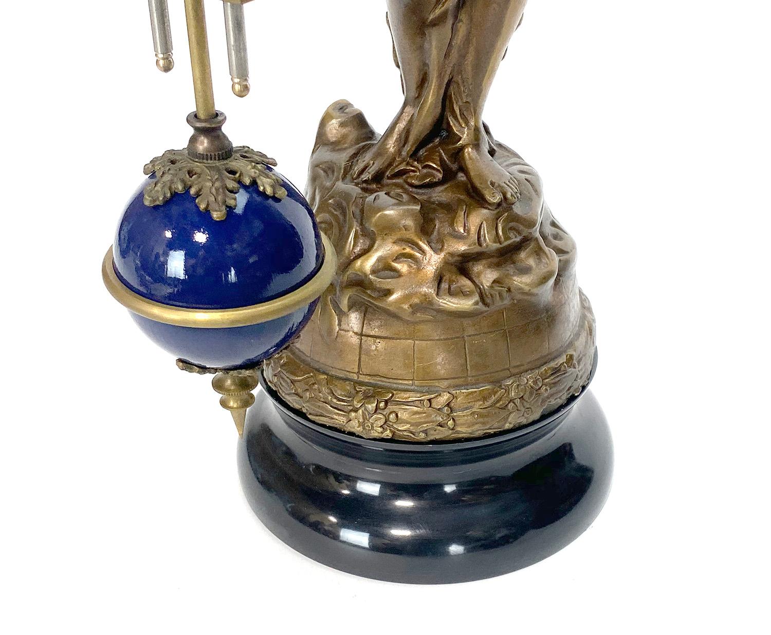 Large Mystery Brass Lady Gloria 8 Day Cobalt Blue Ball Swinging Clock In Excellent Condition For Sale In Danville, CA