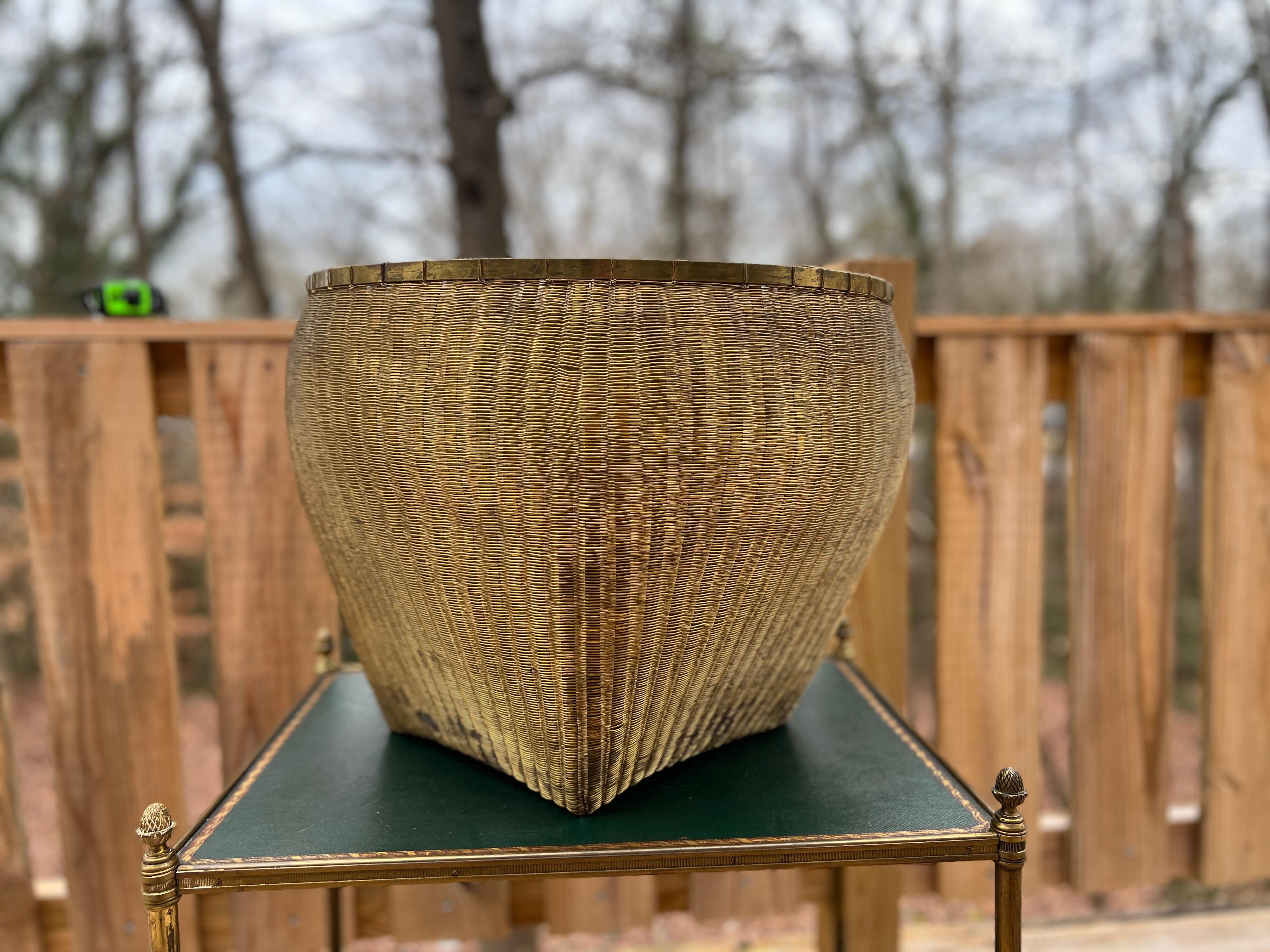 French, C. 1900.

An antique hand woven with bronze & brass wire basket or trash can. Flexible surface, very heavy and high quality.