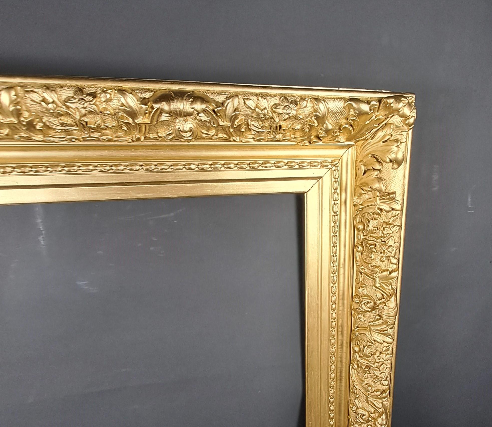 Gran marco Napoleón III de madera y estuco dorado siglo XIX en venta