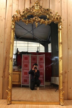 Large Napoleon III Mirror In Gilded Wood With Putti And Mascaron
