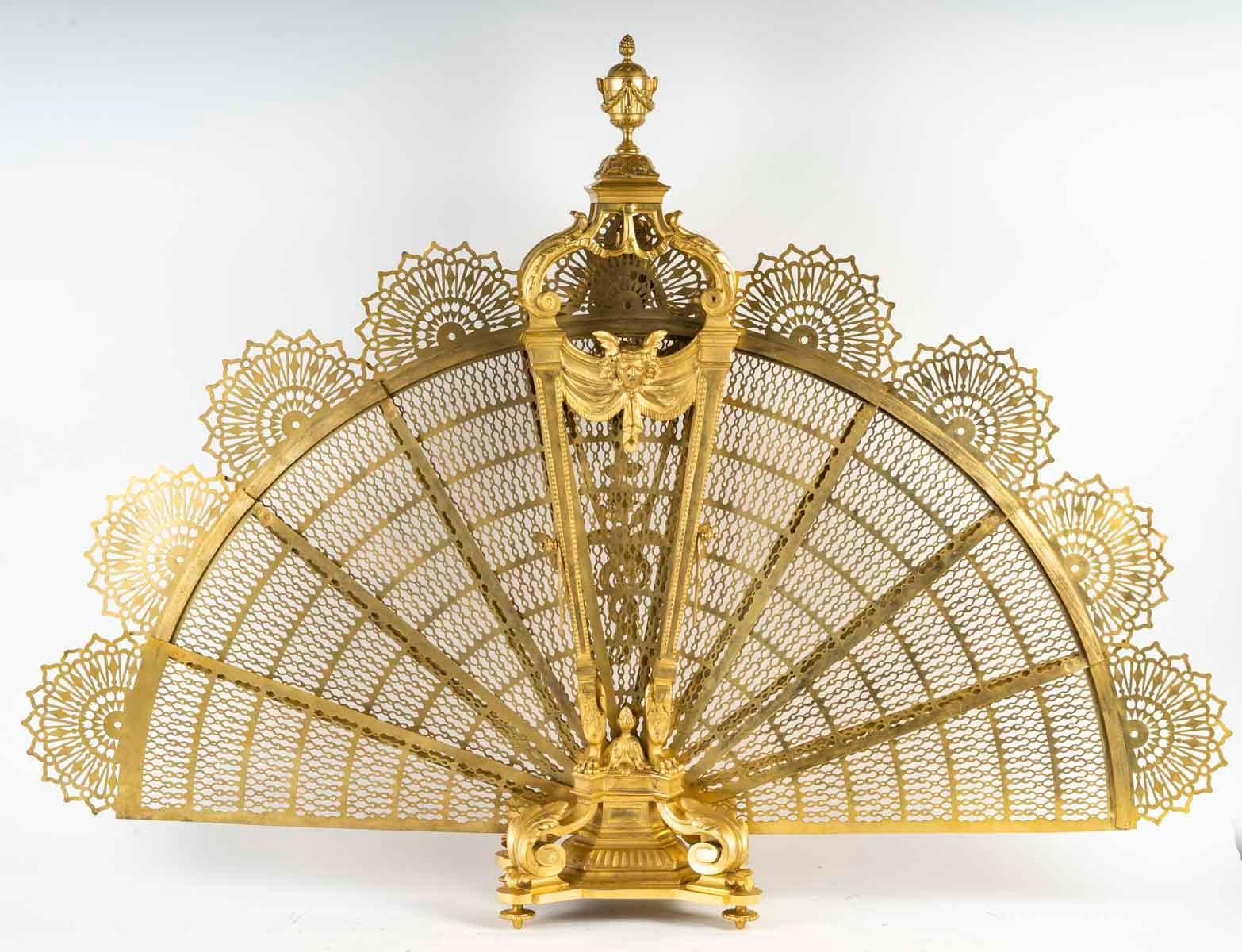 Large Napoleon III period ormolu fire screen.

Large Napoleon III period gilt bronze fire screen, very fine quality fireplace surround in the Louis XV style, 19th century.
H: 85cm. W: 120cm, D: 22cm