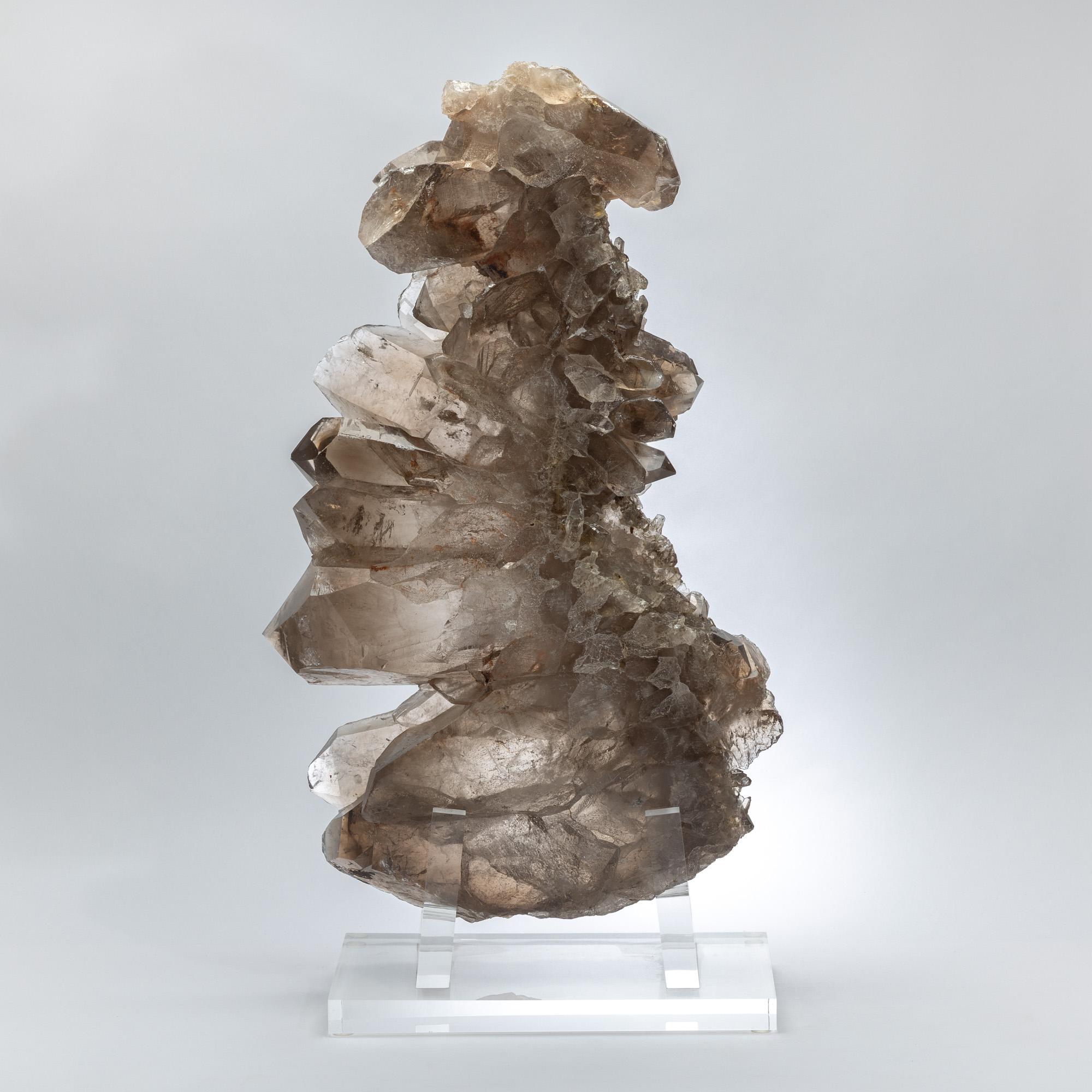Large Smoky Quartz Point on Custom Acrylic Base
Minas Gerais, Brazil

This impressive smoky quartz point originates from the mineral-rich landscapes of Minas Gerais, Brazil, a region globally celebrated for its exceptional quartz formations. With a