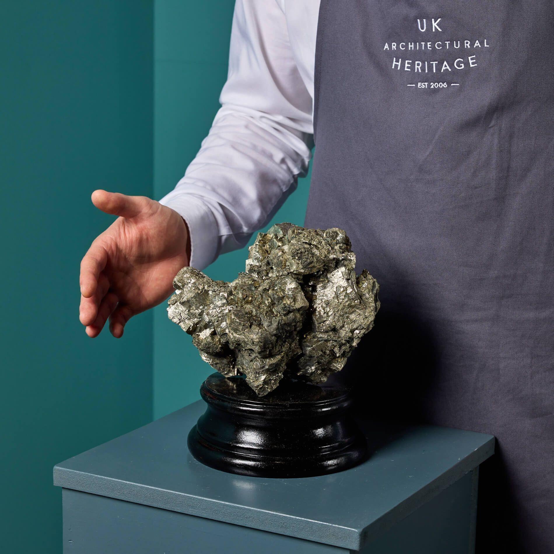 A large natural cabinet scale pyrite specimen, originating from 5/15 level Wheal Jane Mine, Cornwall.

This native British specimen has a lustrous exterior that catches the light beautifully.

Naturally formed over millions of years, this striking