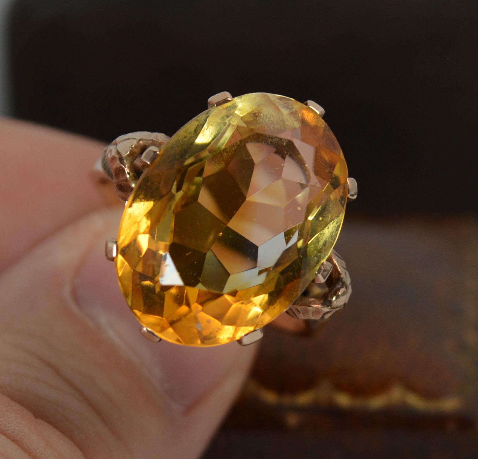 An impressive Citrine statement ring. c1940.
SIZE ; Q UK, 8 US. Can be sized.
Solid 9 carat rose gold shank and claw setting.

Set with a natural citrine of amazing vibrant orange colour and set in an eight claw setting to measure approx 13mm x