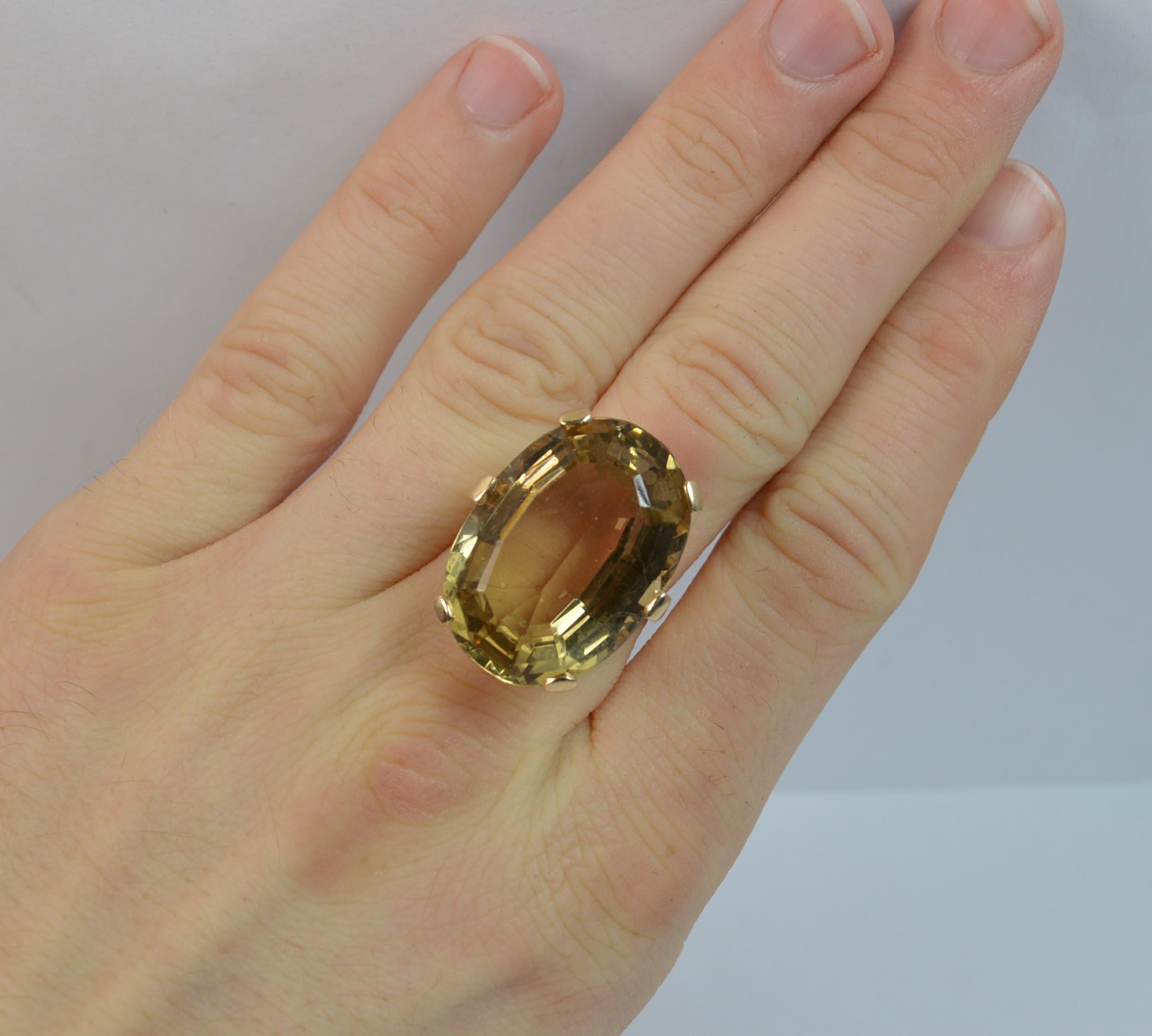 
A beautiful vintage or retro ring

Solid 9 carat yellow gold ring.

Designed with a huge oval cut natural citrine in a six claw setting.

18mm x 25mm x 10mm stone approx.


Condition ; Very good. Well set stones. Issue free. Clean band.
Please view