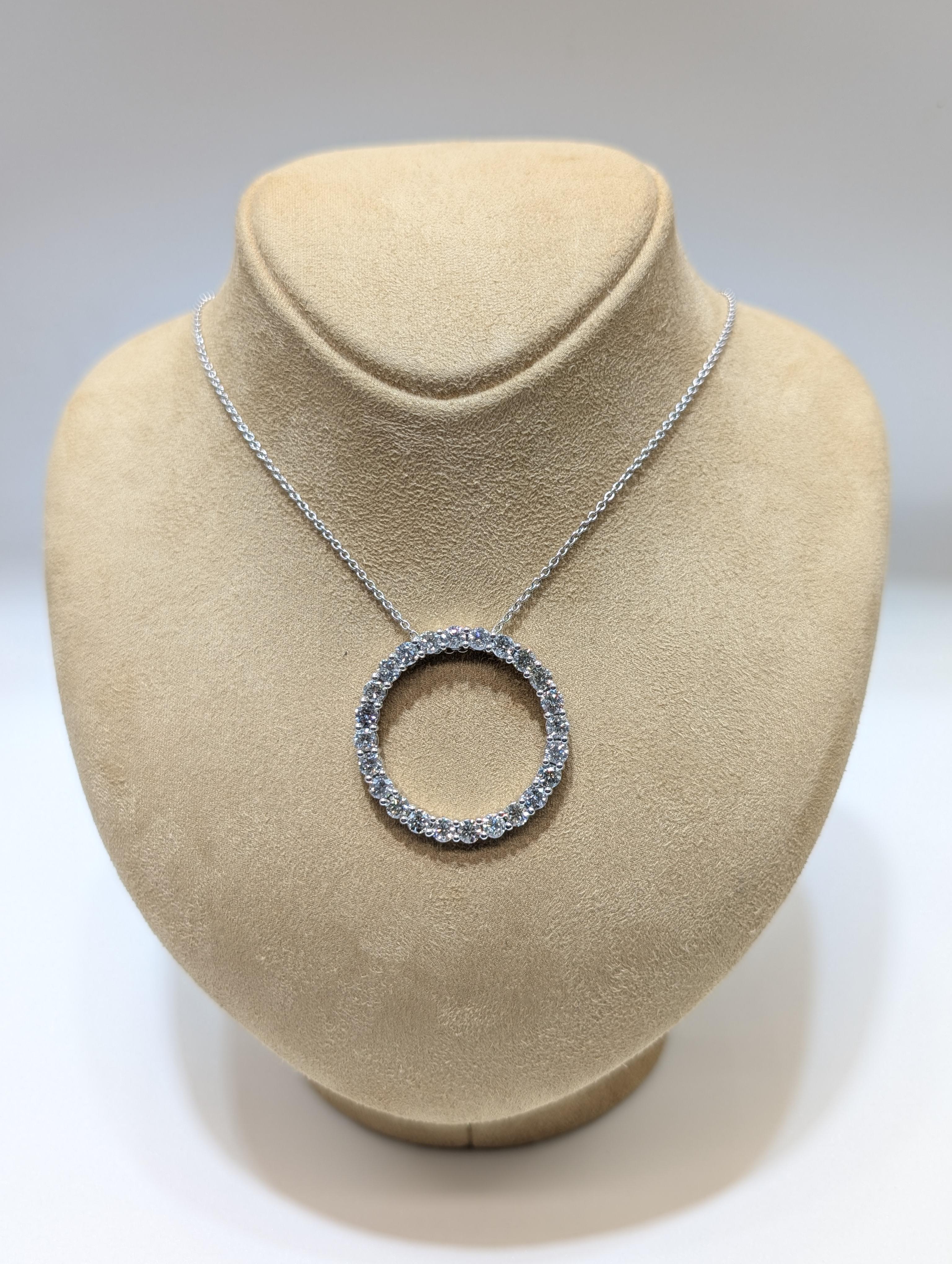 14K White Gold Diamond Circle Pendant Necklace – 4.65ctw Brilliant Round Diamonds

A timeless treasure, this exquisite pendant features a large, radiant circle of 24 brilliant round-cut diamonds totaling 4.65 carats, gracefully suspended from a