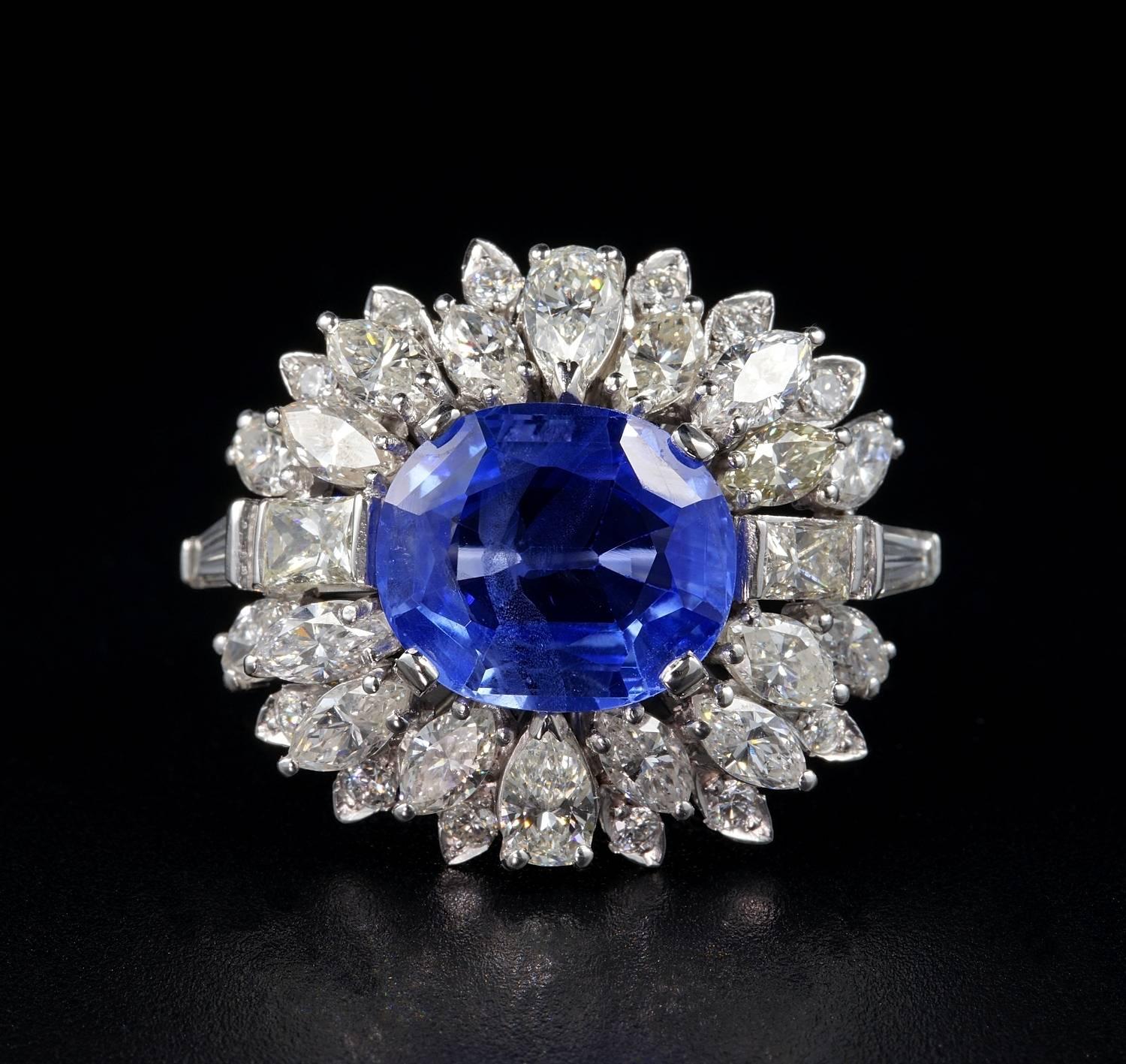 An impressive Diamond and sapphire cocktail ring.
Large crown beautifully designed and hand crafted during the 60's.
Platinum skilfully hand made. Italian origin.
Boasting a magnificent 7.46 Ct Natural no heat Sapphire Ceylon origin - fully