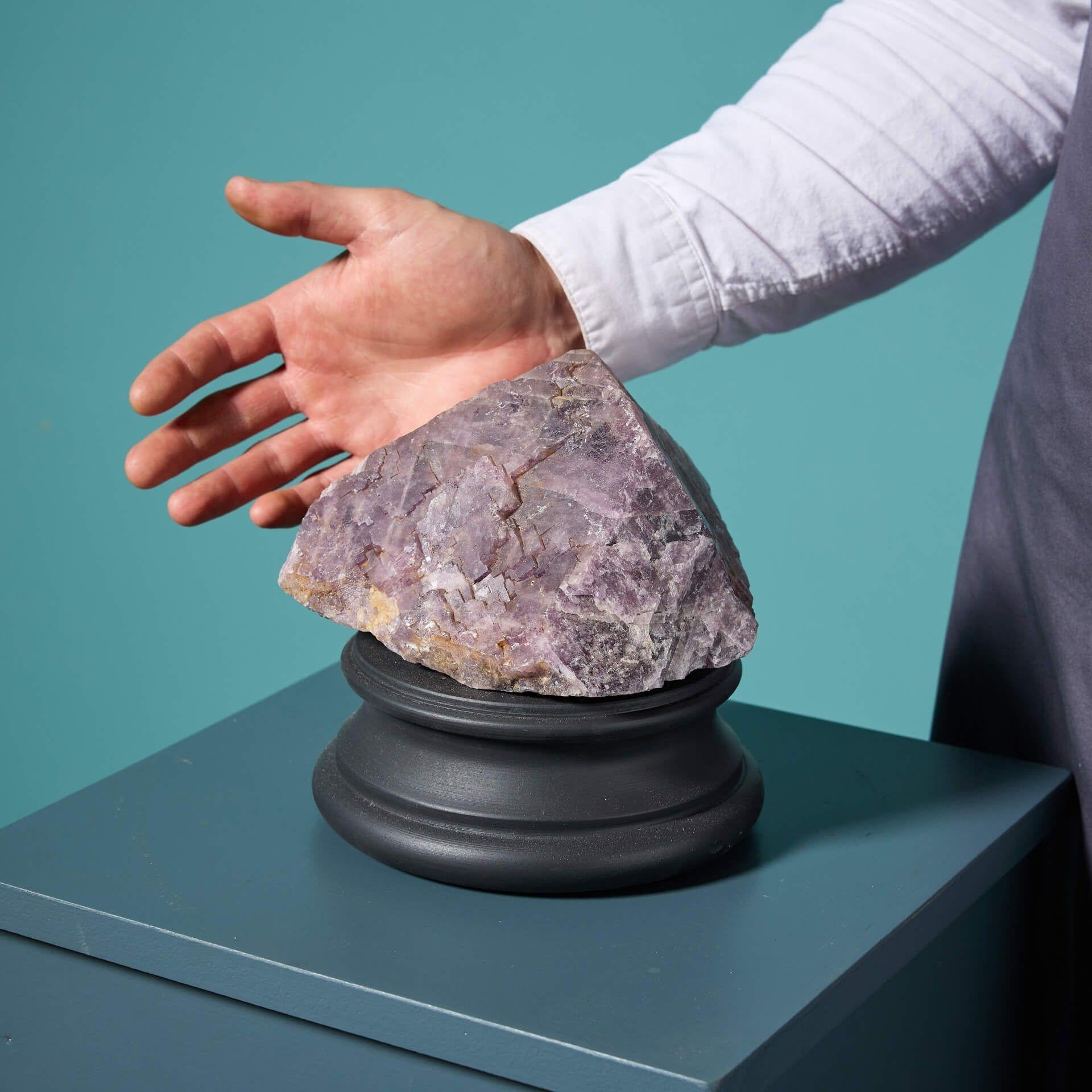 A large naturally-occurring purple fluorite mineral specimen, presented on one of our exclusive medium bases for display.

Discovered in a range of colours, fluorite specimens can range from vibrant shades of purple and blue to rich greens and