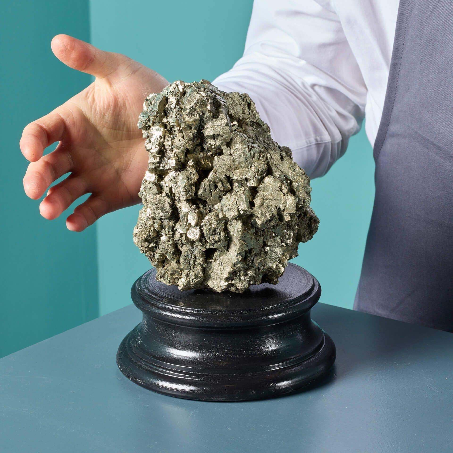A large natural pyrite specimen. Originating from 5/15 level Wheal Jane Mine, Cornwall, this native British pyrite has a lustrous exterior that catches the light beautifully.

Naturally formed over millions of years, this striking mineral specimen