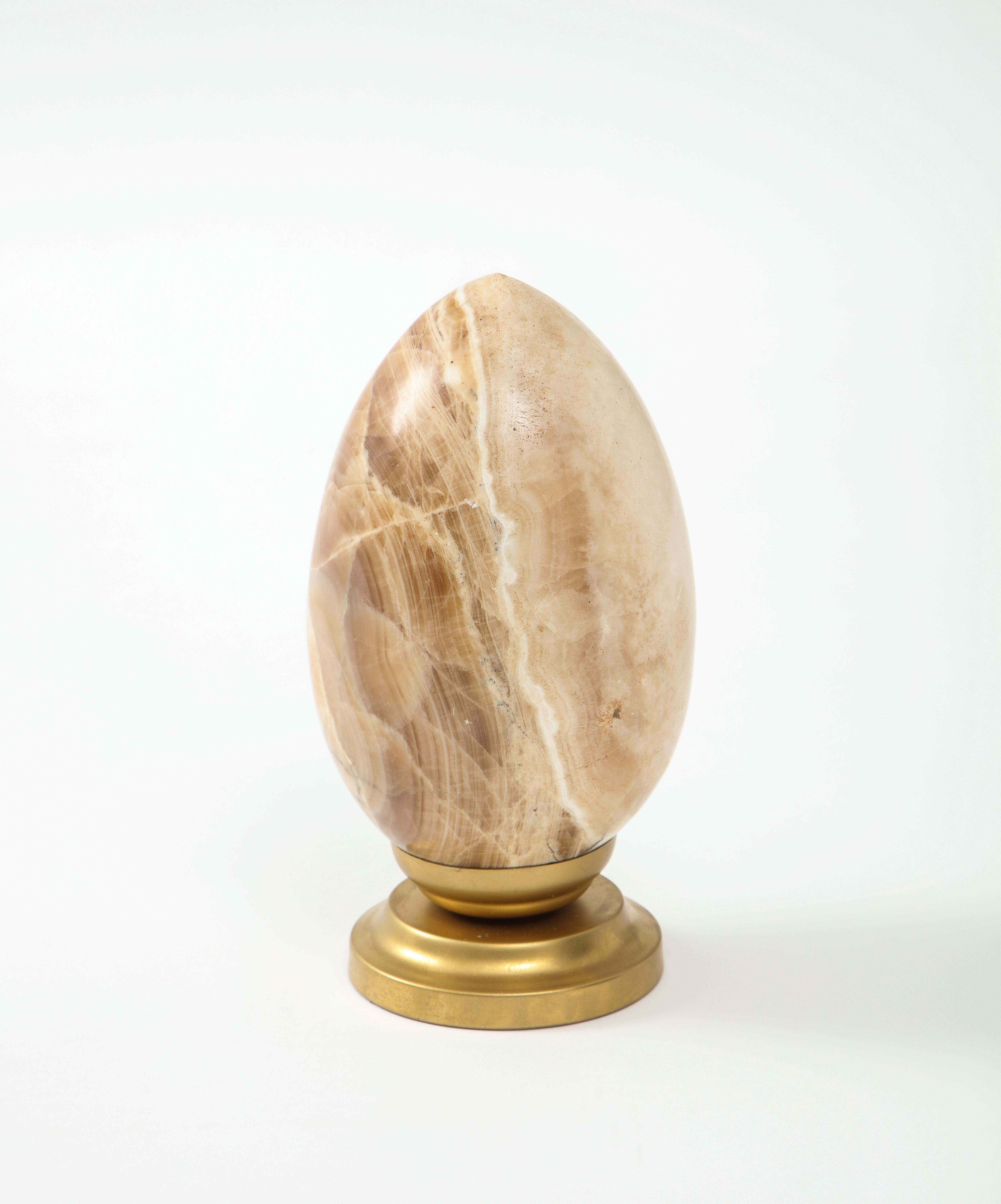 Large Natural Stone Onyx Egg Mounted on a Metal Stand  In Good Condition For Sale In New York, NY