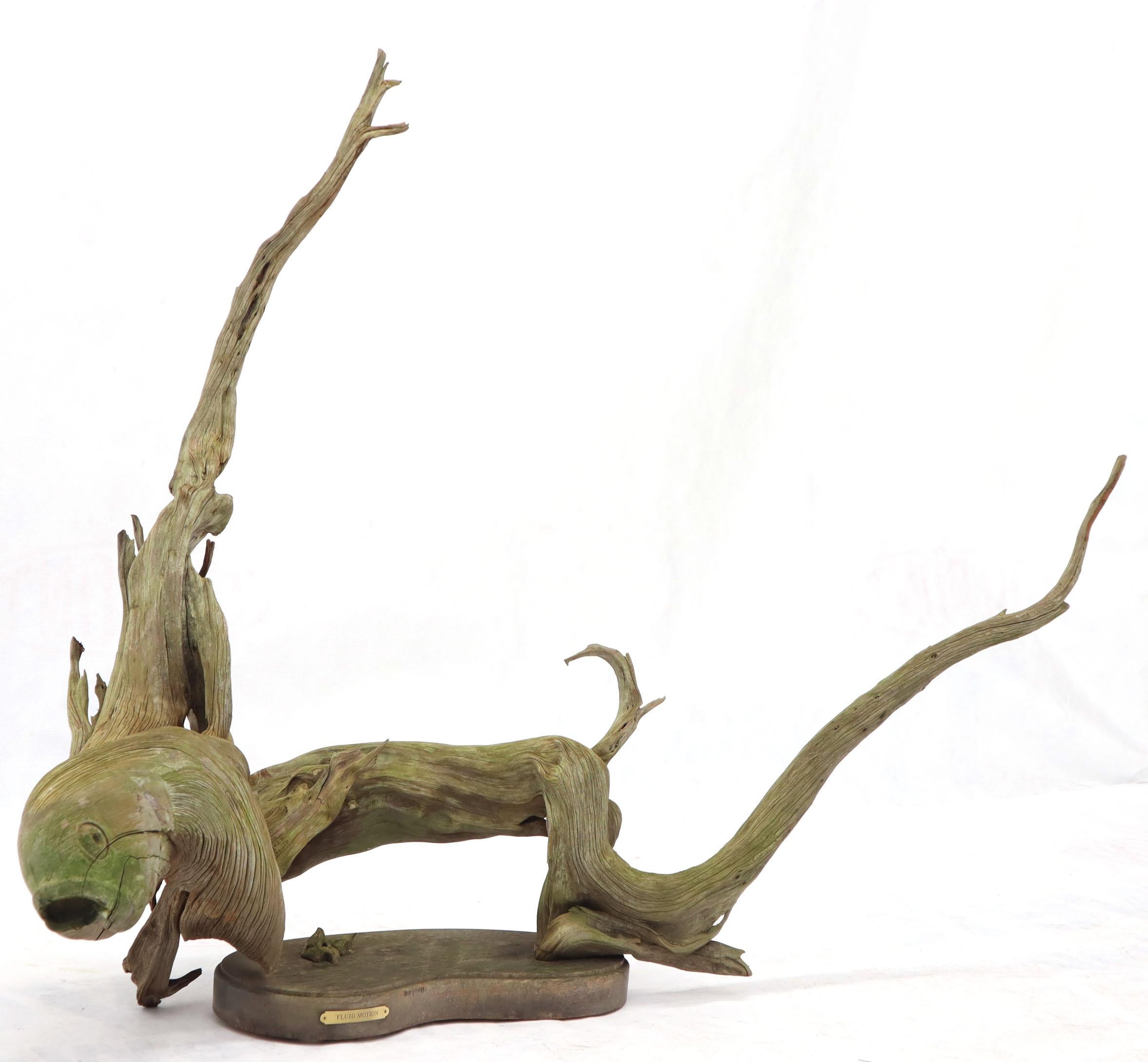 Midcentury abstract natural driftwood fish forming sculpture.
