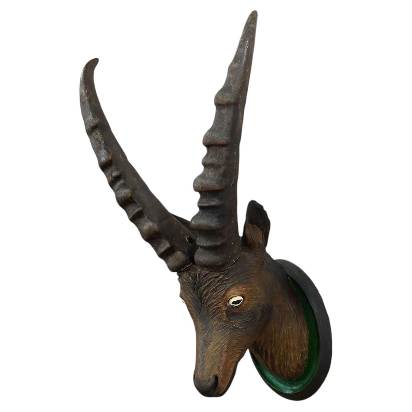 Large Naturalistic Black Forest Carved Ibex Head, ca. 1900s For Sale