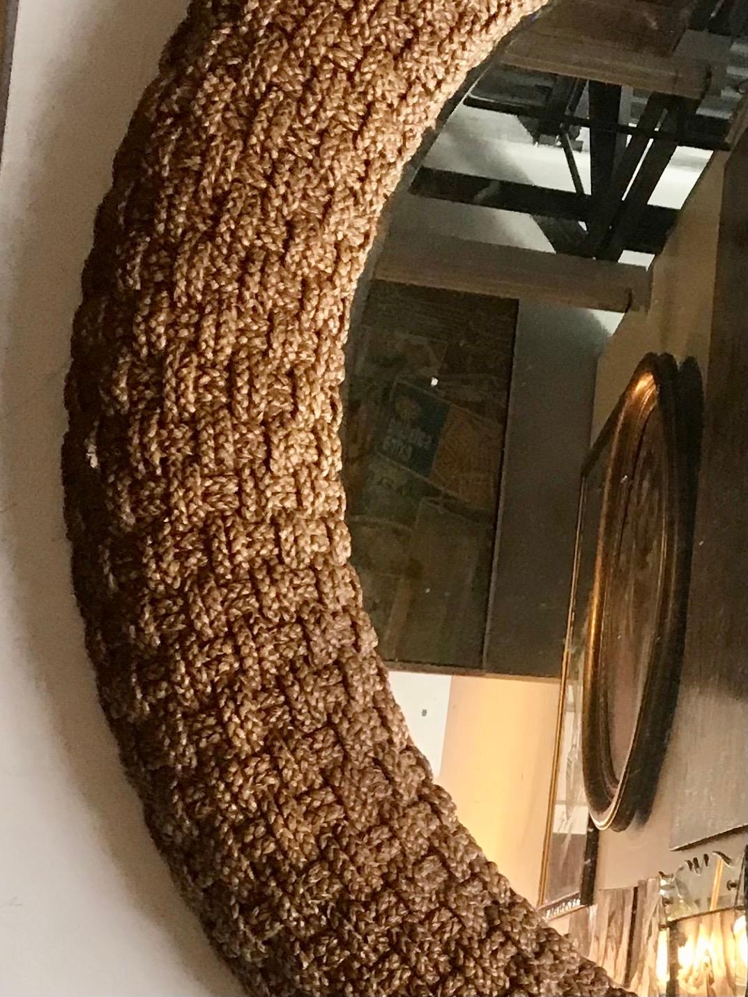 Thick raised woven cord frame this large circular nautical mirror is quite an eye catcher in any room. Perfect
for a Beach House.