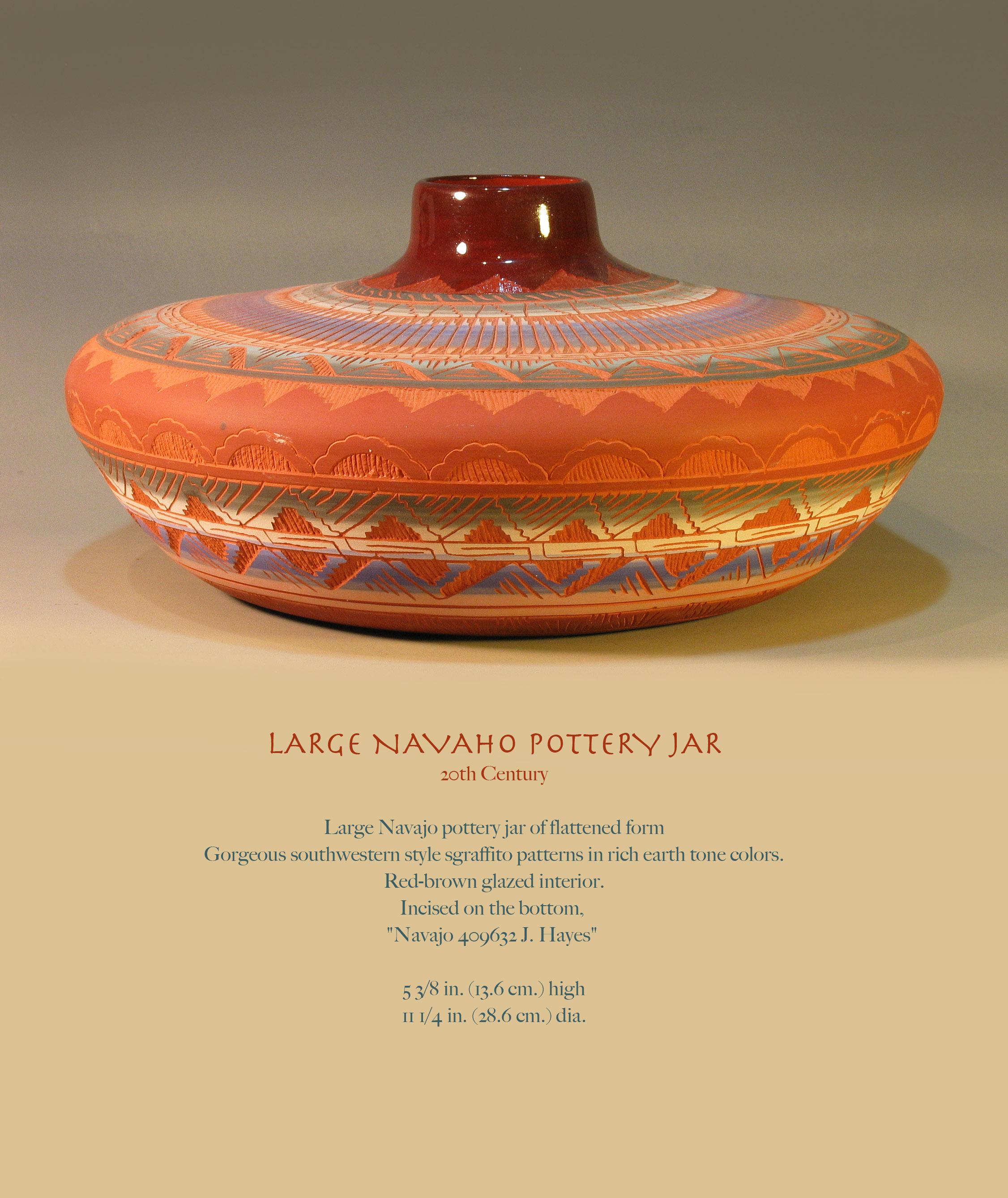 Large Navaho pottery jar
20th century

Large Navajo pottery jar of flattened form
Gorgeous southwestern style sgraffito patterns in rich earth tone colors.
Red-brown glazed interior.
Incised on the bottom, 
