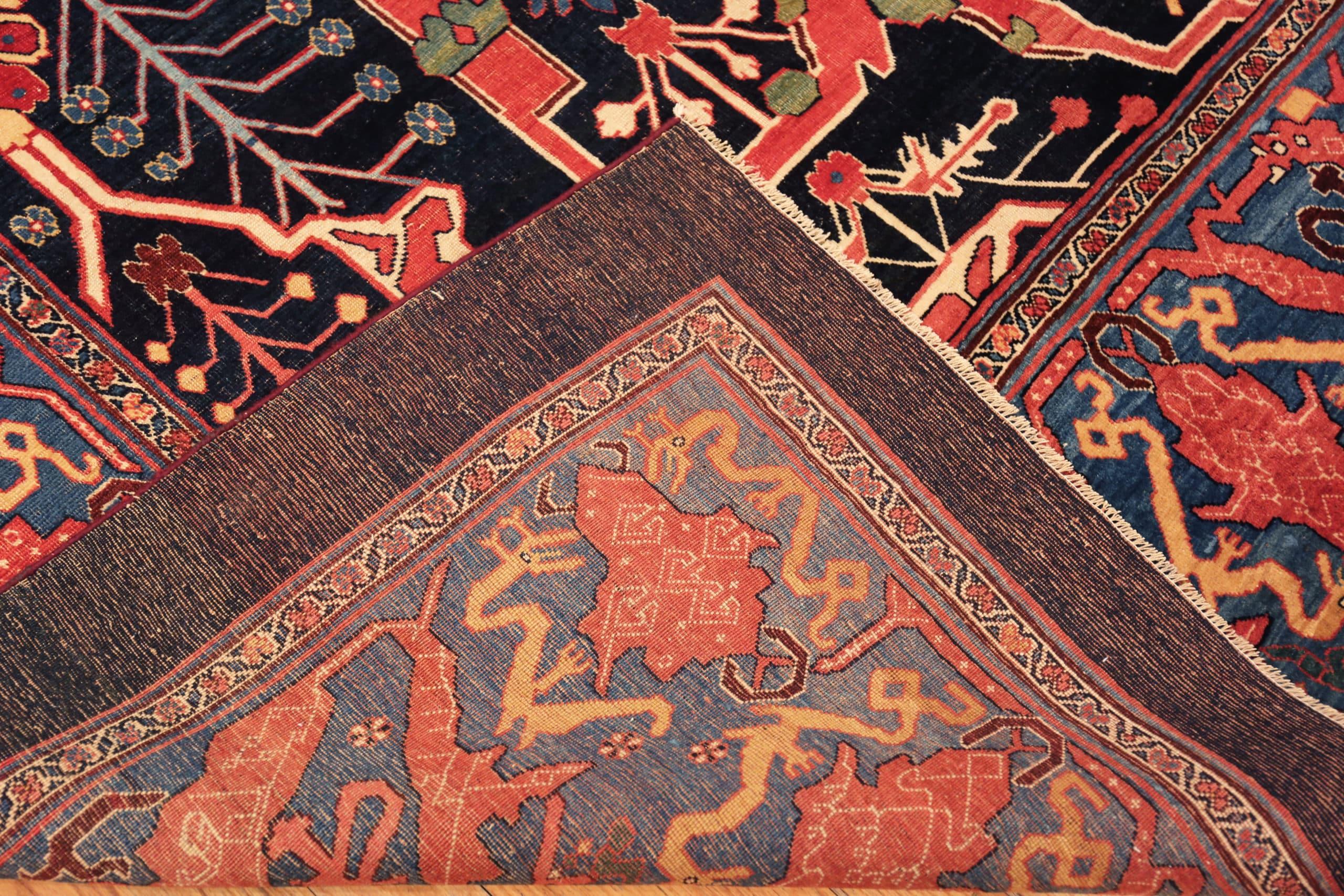 Noué à la main Grand tapis persan ancien Bidjar à fond bleu marine et à motifs greous, 11' x 17'8