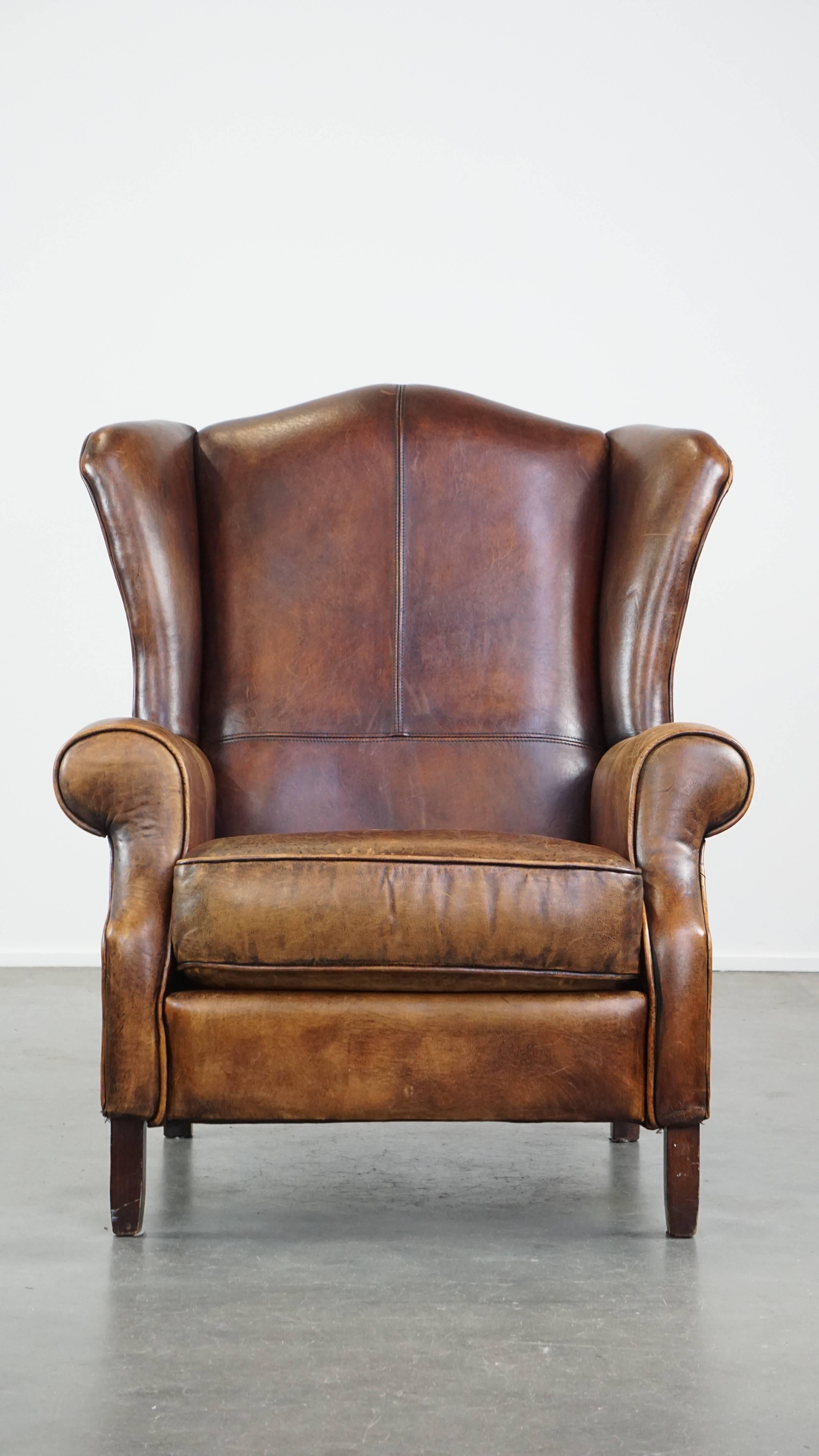 Offered this large, neat sheepskin wing chair with a beautiful design and beautiful colors.

This very beautiful sheepskin wing chair can easily be placed in almost any interior. It has a beautiful design and a calm, neat appearance. This wing chair