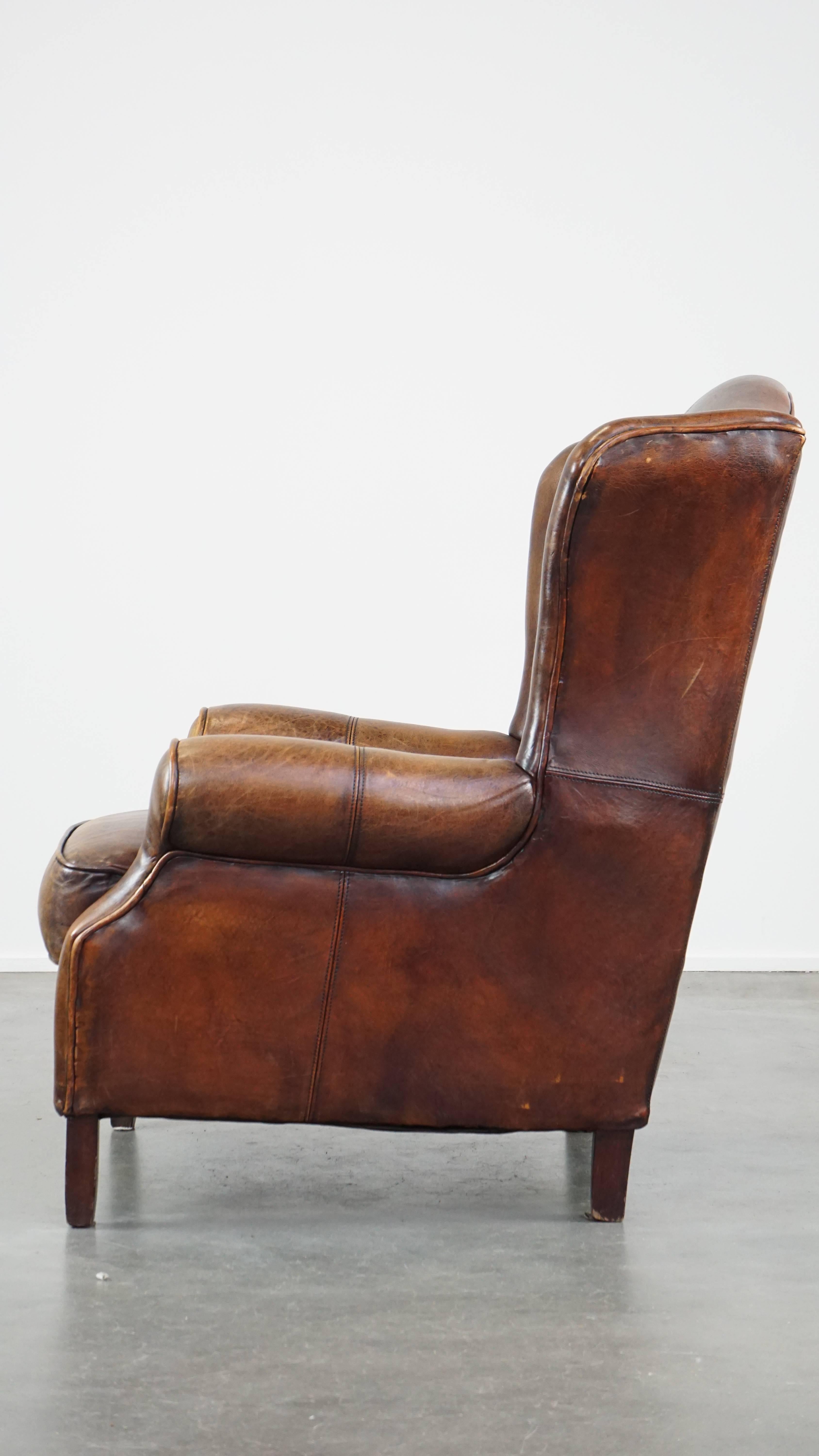 Large, neat sheepskin armchair with a beautiful design and beautiful colors In Fair Condition For Sale In Harderwijk, NL