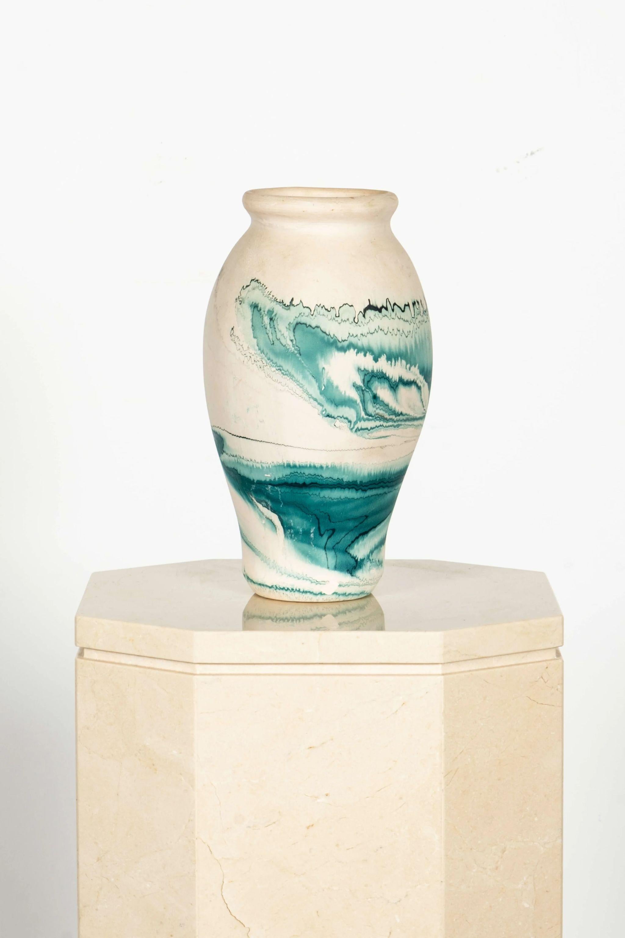 Large-scale handpainted Nemadji Pottery piece. Pair it with your own collection of swirl ceramics or let it stand proud on its own. 

(Interior is unglazed, so it is suitable for dry branches/florals only.)