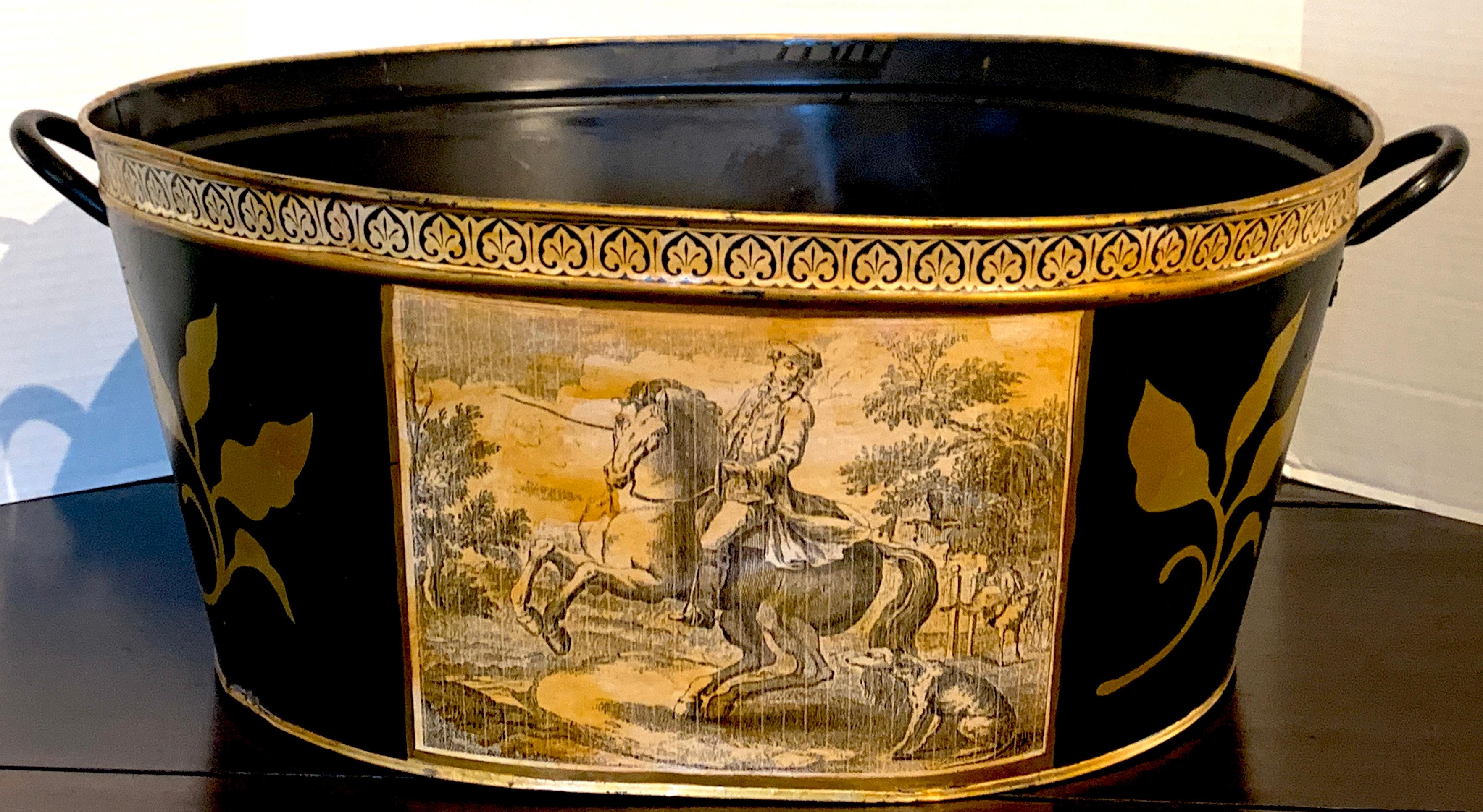 Large neoclassical equestrian tole decorated footbath, each side decorated with a gentleman on horseback with his dog, with twin handles. This is a very large basin.
Measures 27