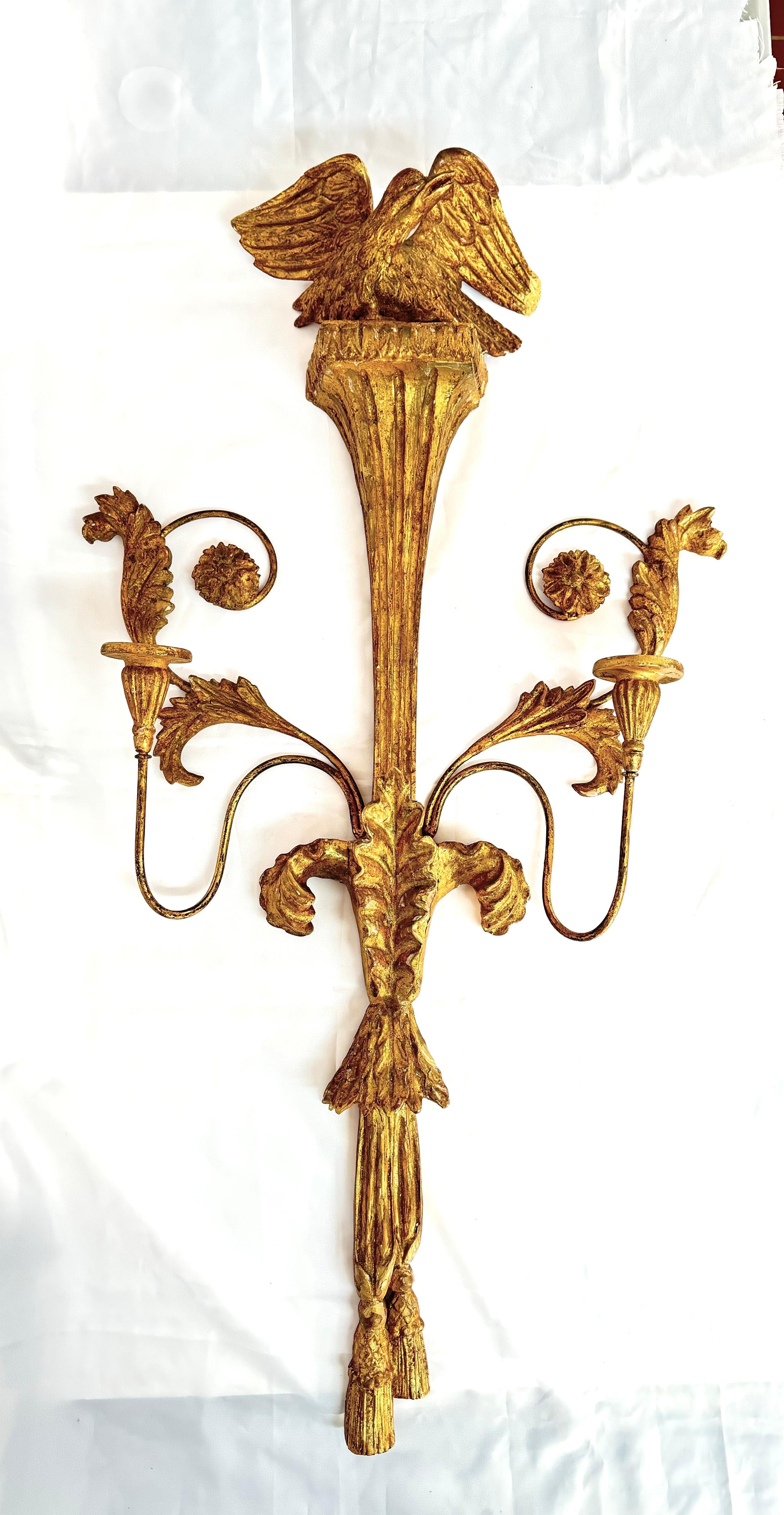 Large Neoclassical Gilt Wooden Eagle Sconce. This is a two candled wall sconce and is not electrified. Use with candles only. Romantic and charming for any formal room . Small loss on right eagle wing . 