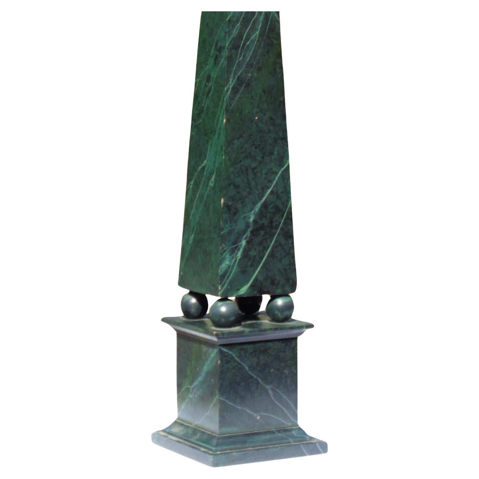 Large Neoclassical style wood obelisk in original verde antigua faux marbleized painted finish. Initially used as a store display. Circa 1960's. Measures 38 1/2