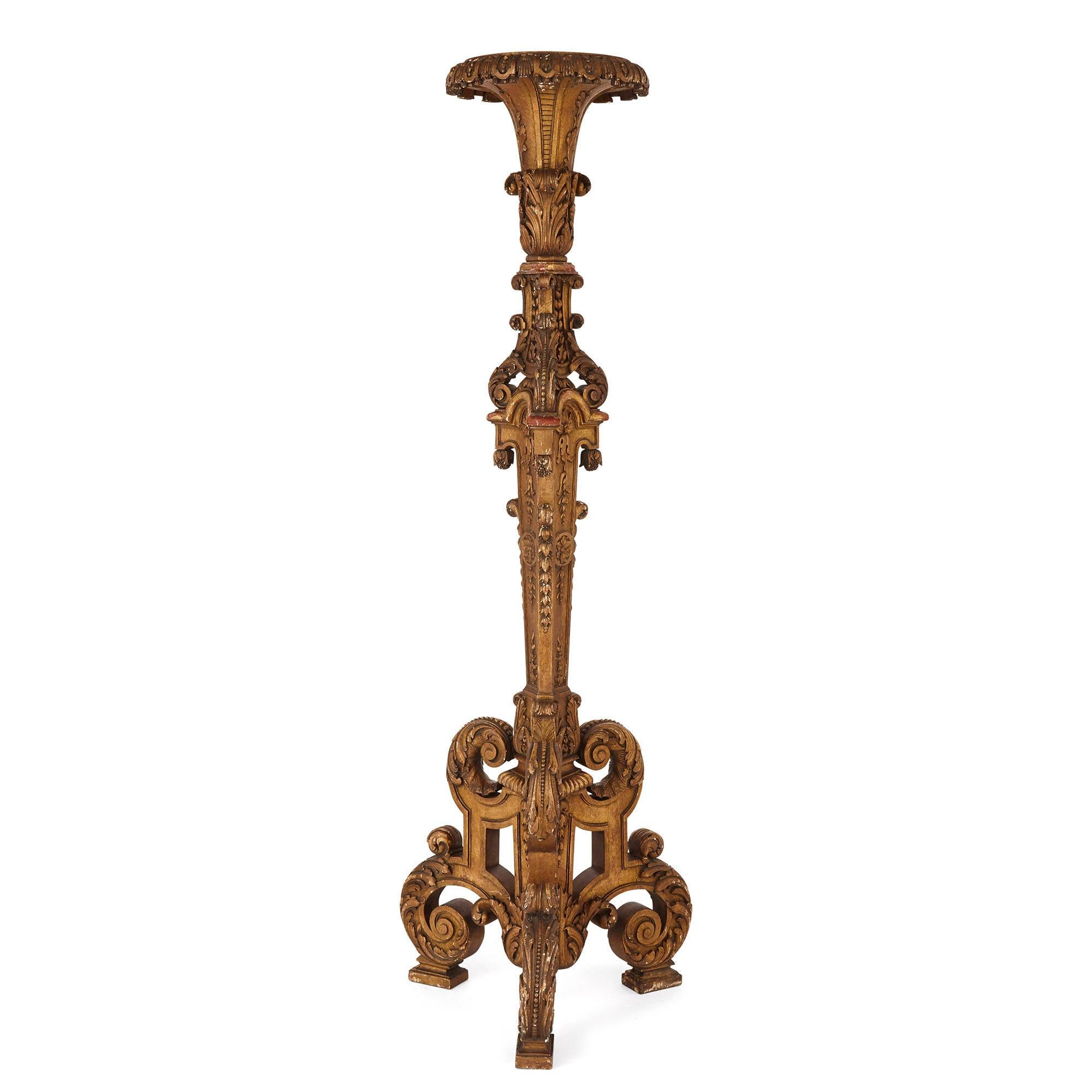Large neoclassical style giltwood torchère
French, late 19th century
Measures: Height 170cm, diameter 52cm

This fine and large neoclassical style torchère is crafted from delicately carved and giltwood. The torchère is raised on a tripod base