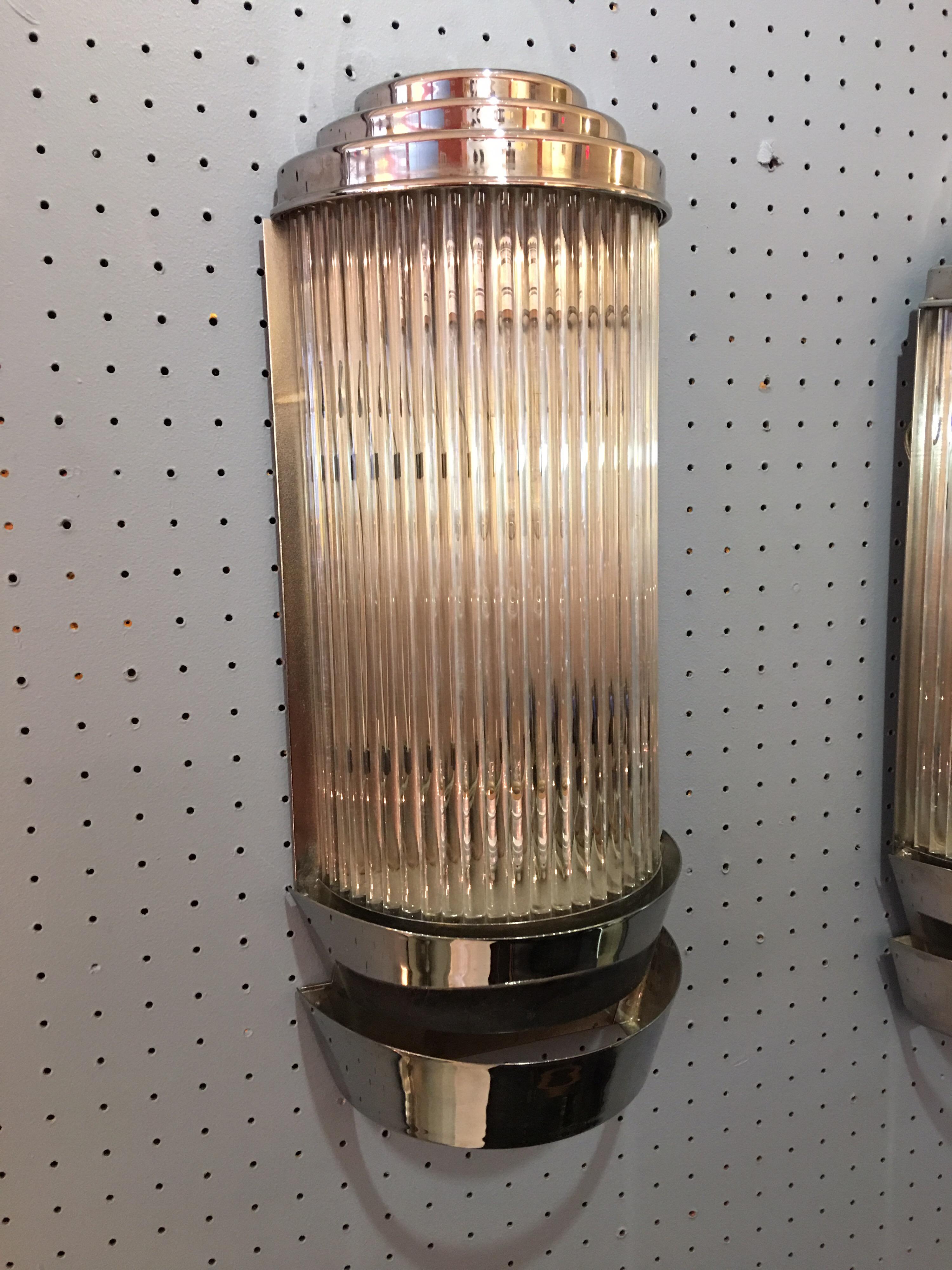 Fully restored deco sconces with glass rods and nickel frames. Additional bottom light can be turned off and on with a pull chain. Great scale!