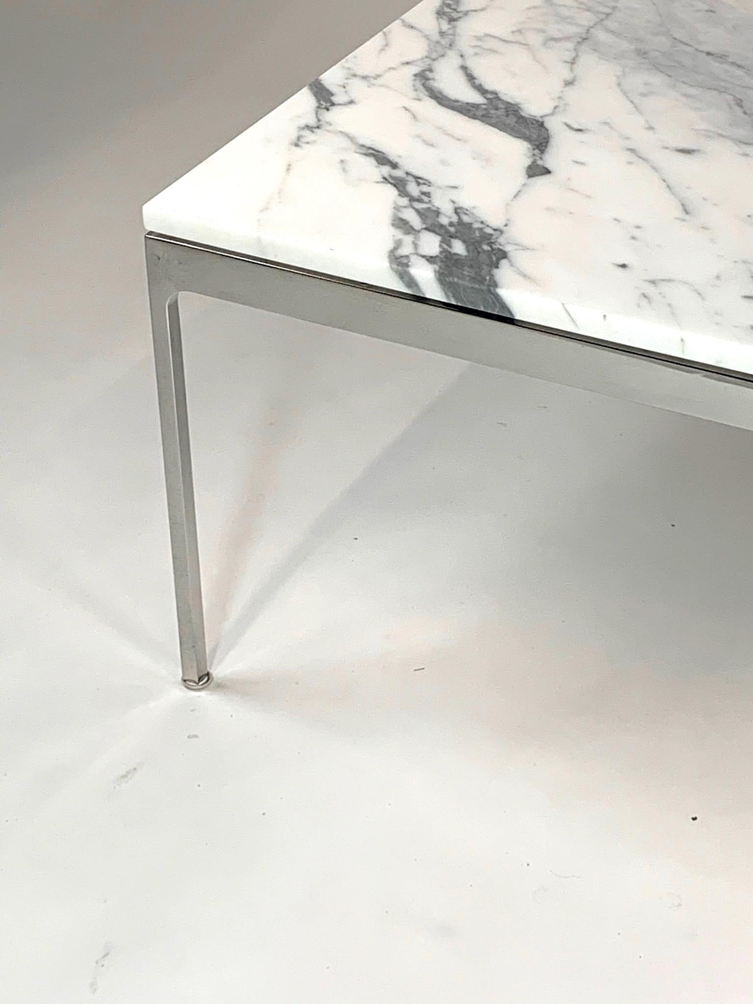Impressive 42 inch square Nicos Zographos stainless steel and marble 35 series low coffee table. A beautiful highly figured piece of stone.