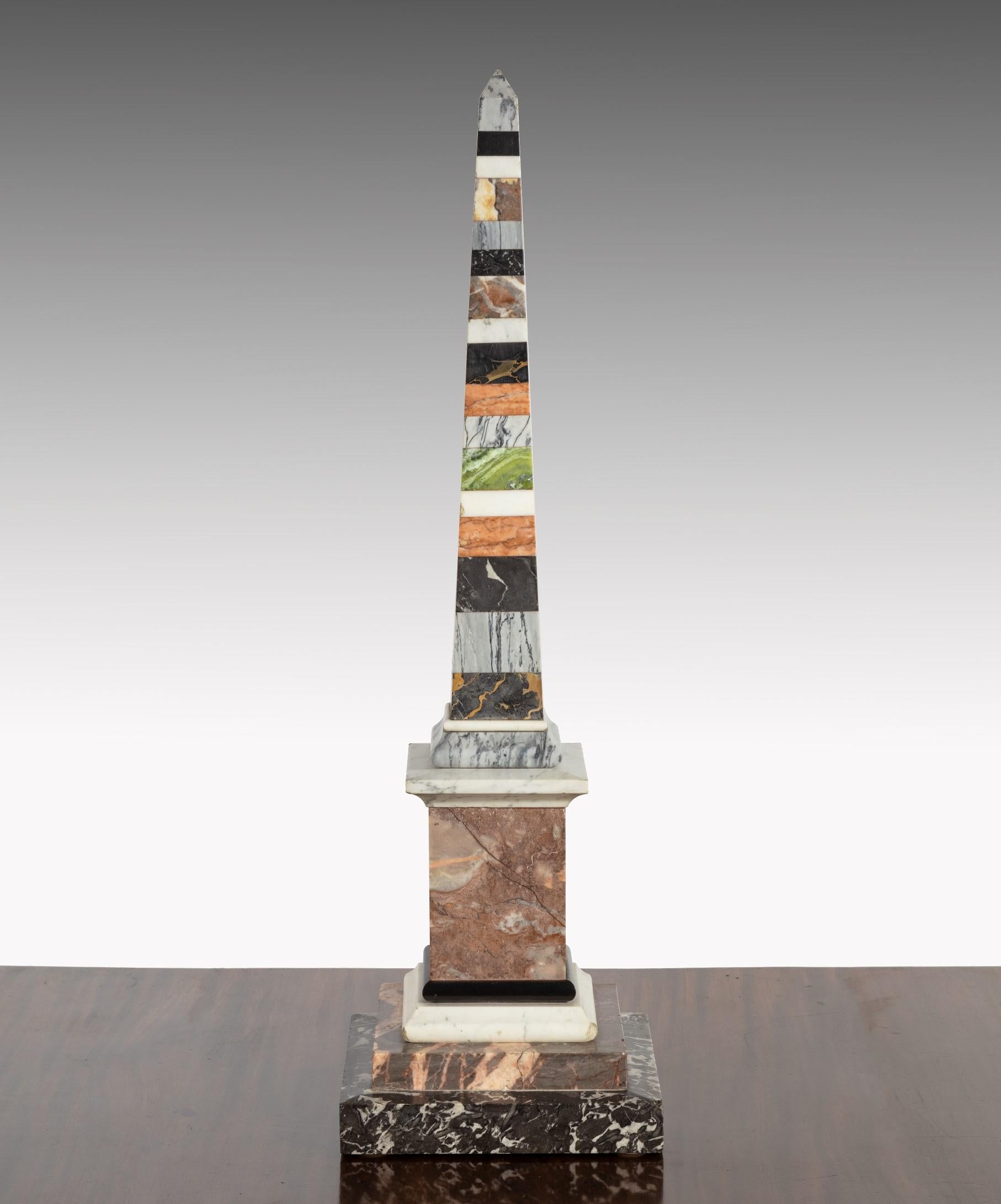 A superb Grand Tour specimen marble obelisk constructed from a variety of specimen marbles. The obelisk is in good country house condition and is an unusually large example.