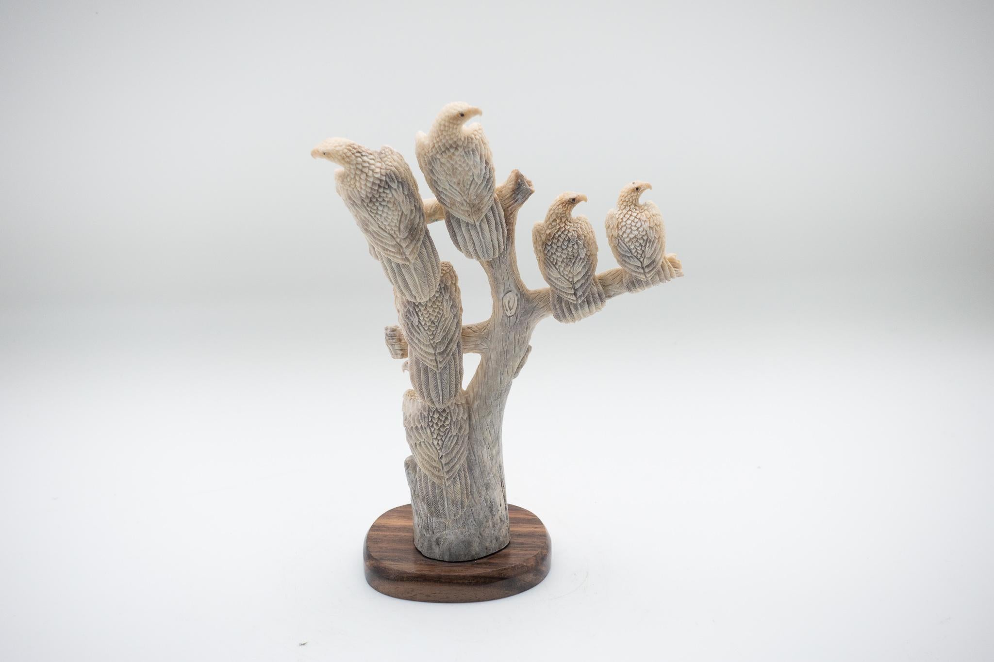 Very detailed large moose antler carving from Indonesia of a group of eagles perched on a tree. This is a one of a kind object. Moose antler was source in the North America and then sent to Asia for the carving.