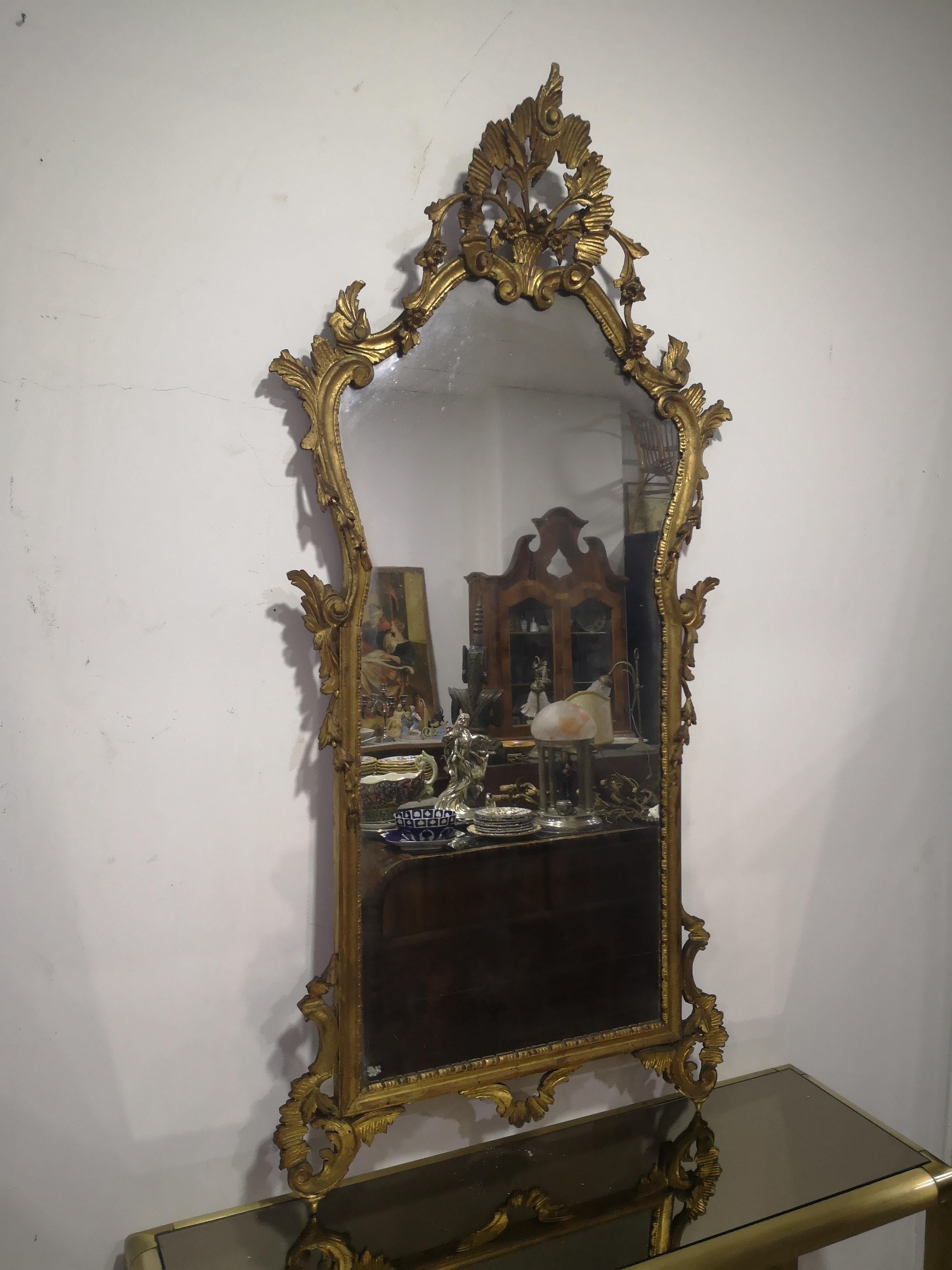 Large Liberty mirror from the early 1900s in good condition
as visible in the photos

The measurements of the mirror are:
Maximum height 163 cm
Width 79 cm

Measurements of the mirror only:
Height 115 cm
Width 53 cm

Available for information or