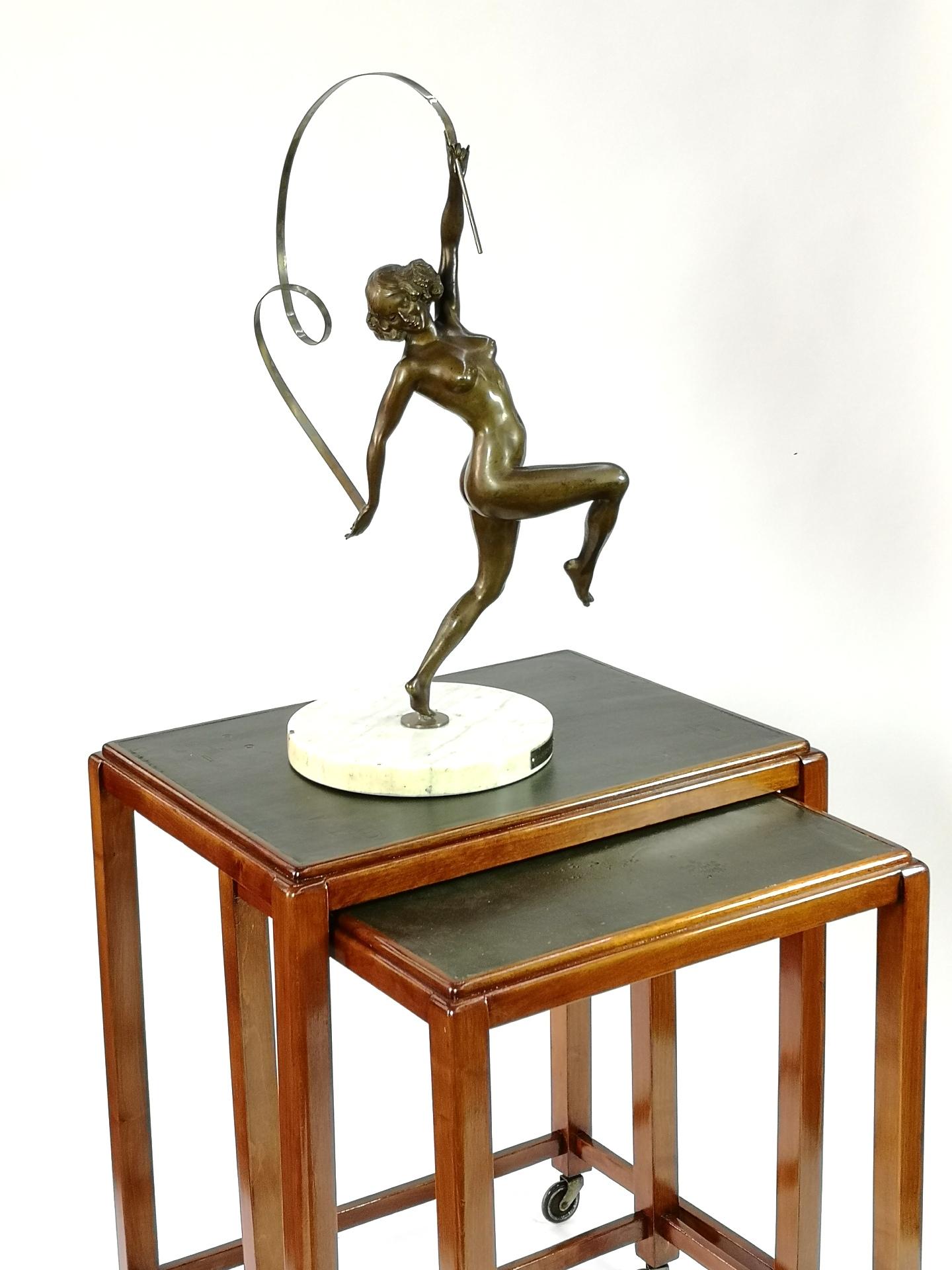 Large nude ribbon gymnast bronze sculpture, from the 1920's, by Gyula Maugsch. Beatufully casted and detailed bronz is a large scale piece from the artist- and is quite a rare design. It depicts a gymnast with a ribbon, smiling, and nude. It's in