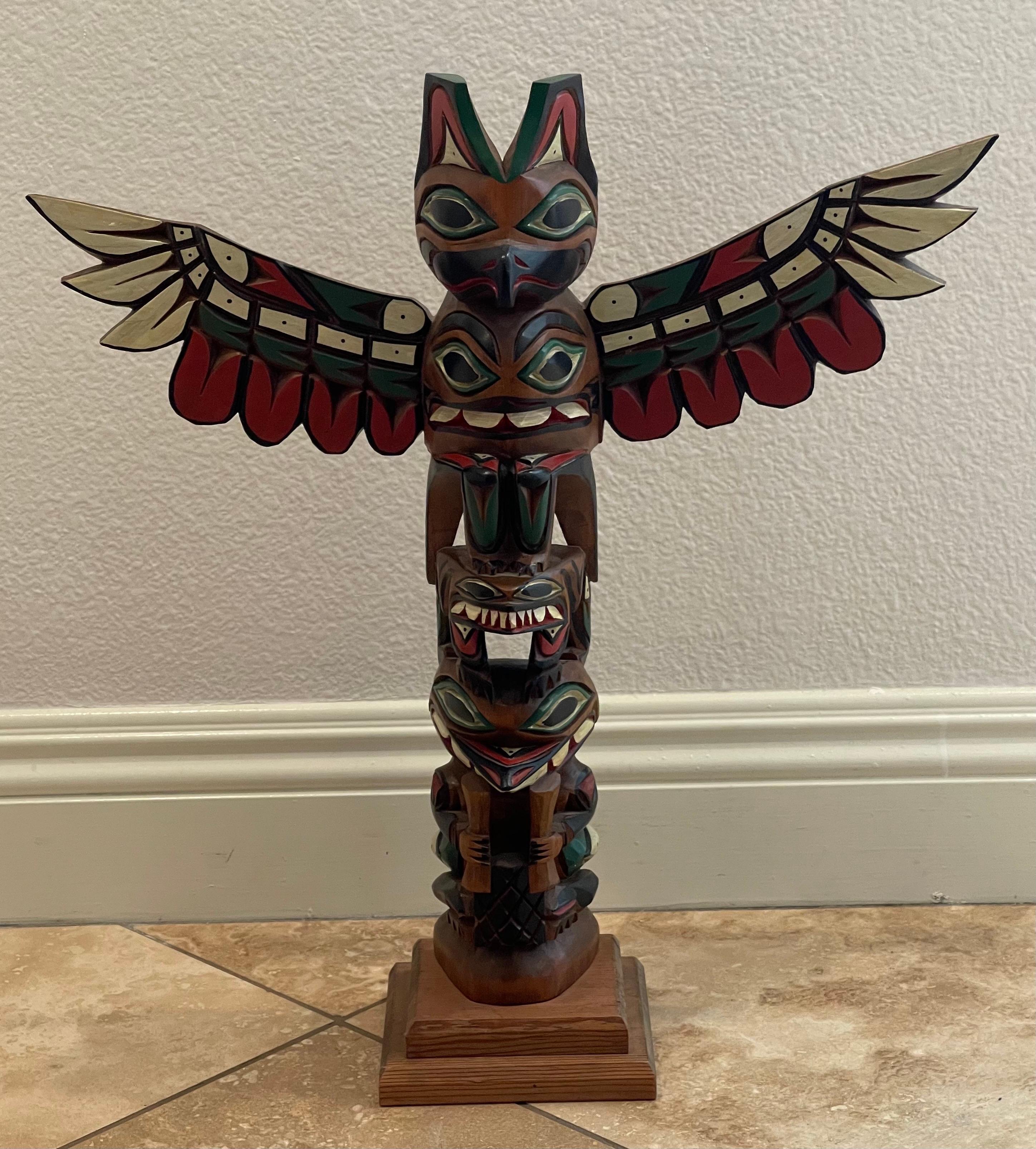 A fine example attributed to master Nuu-chah-nulth carver Sam Williams (1884-1979), circa 1930s. Sam Williams who started carving for the Ye Olde Curiosity shop in Seattle, WA in the early 1900s and his children, grandchildren and great