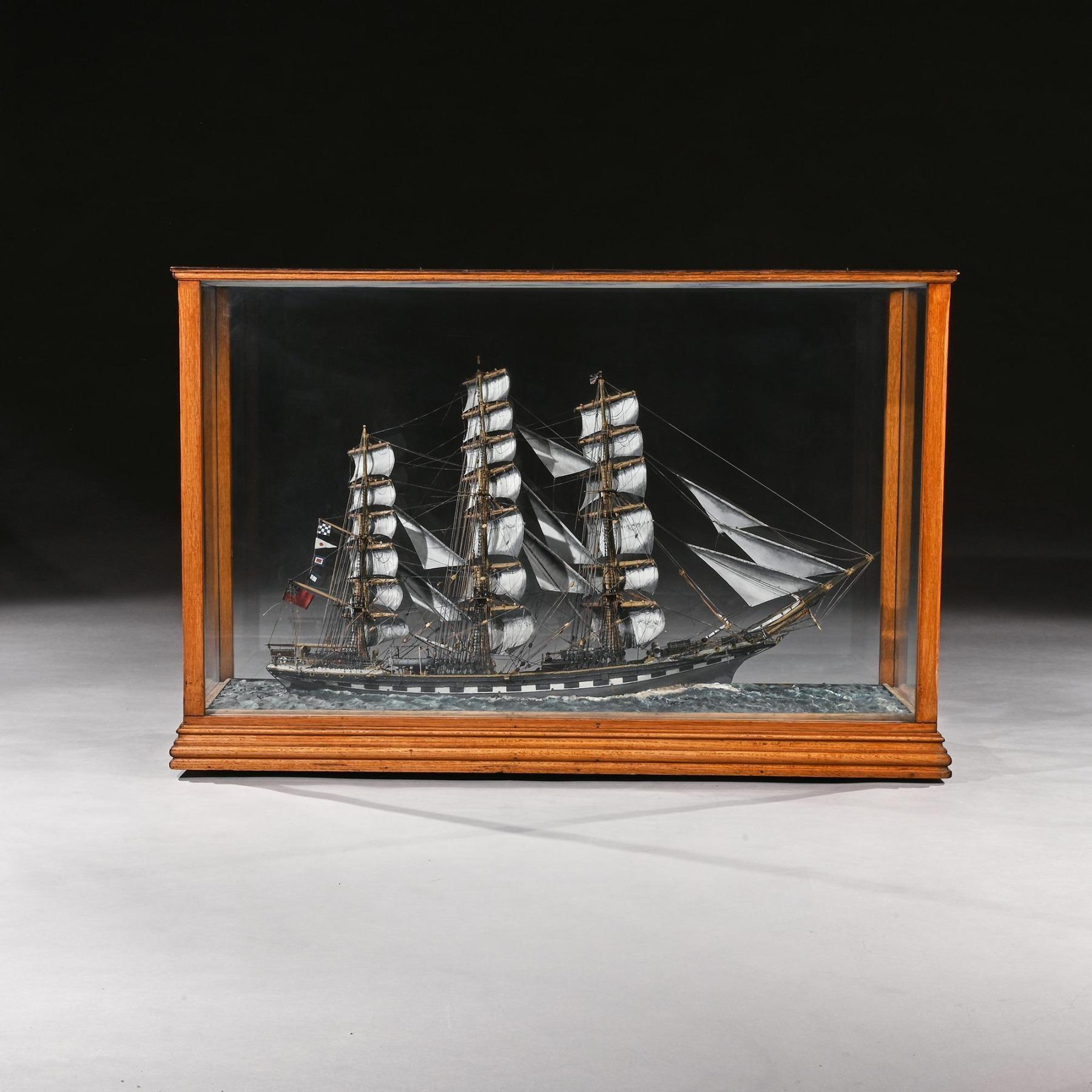 An exceptional 19th century Model of the tea clipper ‘Glengarry’ in full sail, built by Royden & Sons Liverpool in an oak and glass display case.



English Circa 1868.



The Glengarry was a famous Tea Clipper ship that traveled all over
