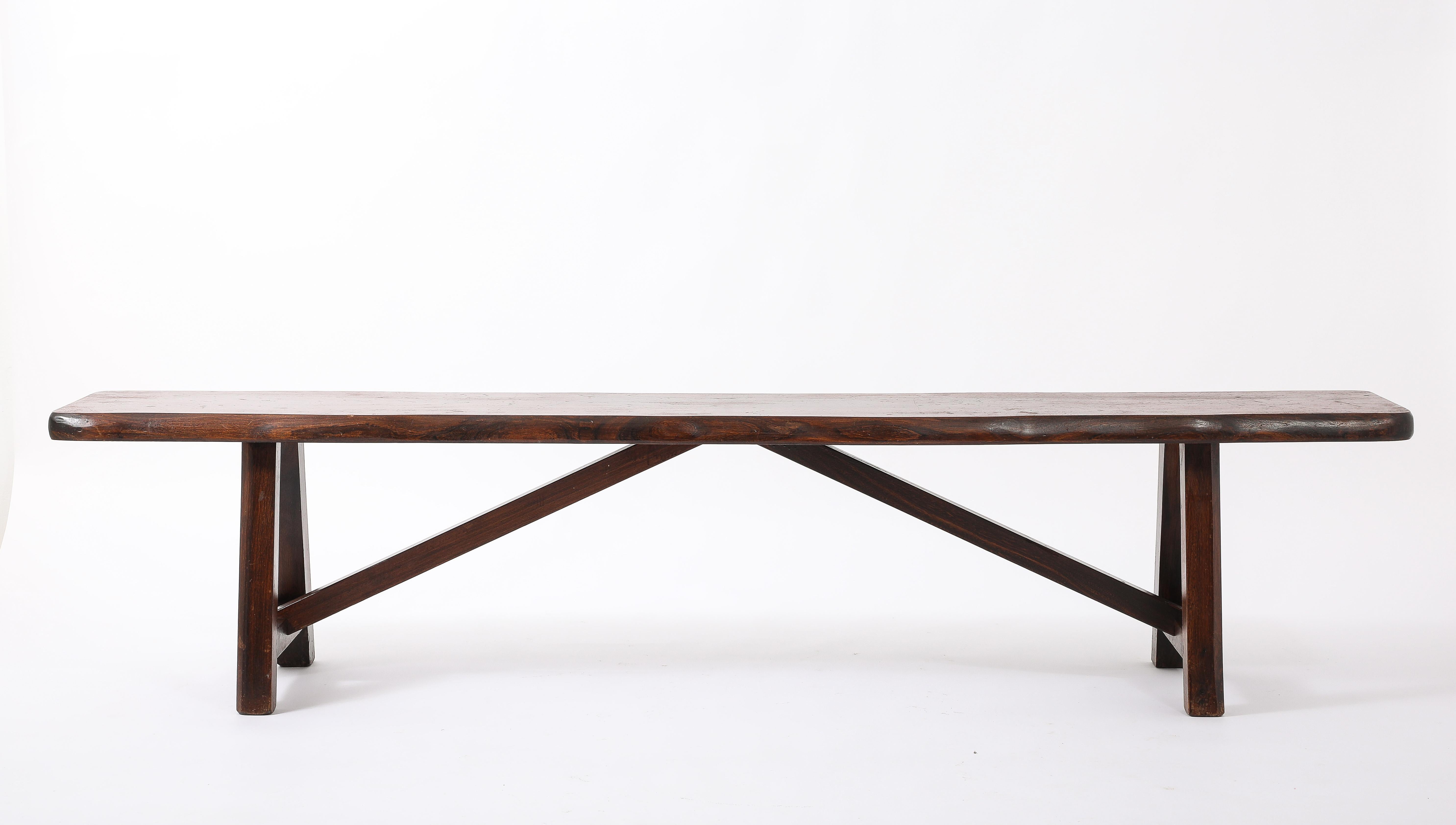 Large Scale Elm bench with a trestle base.