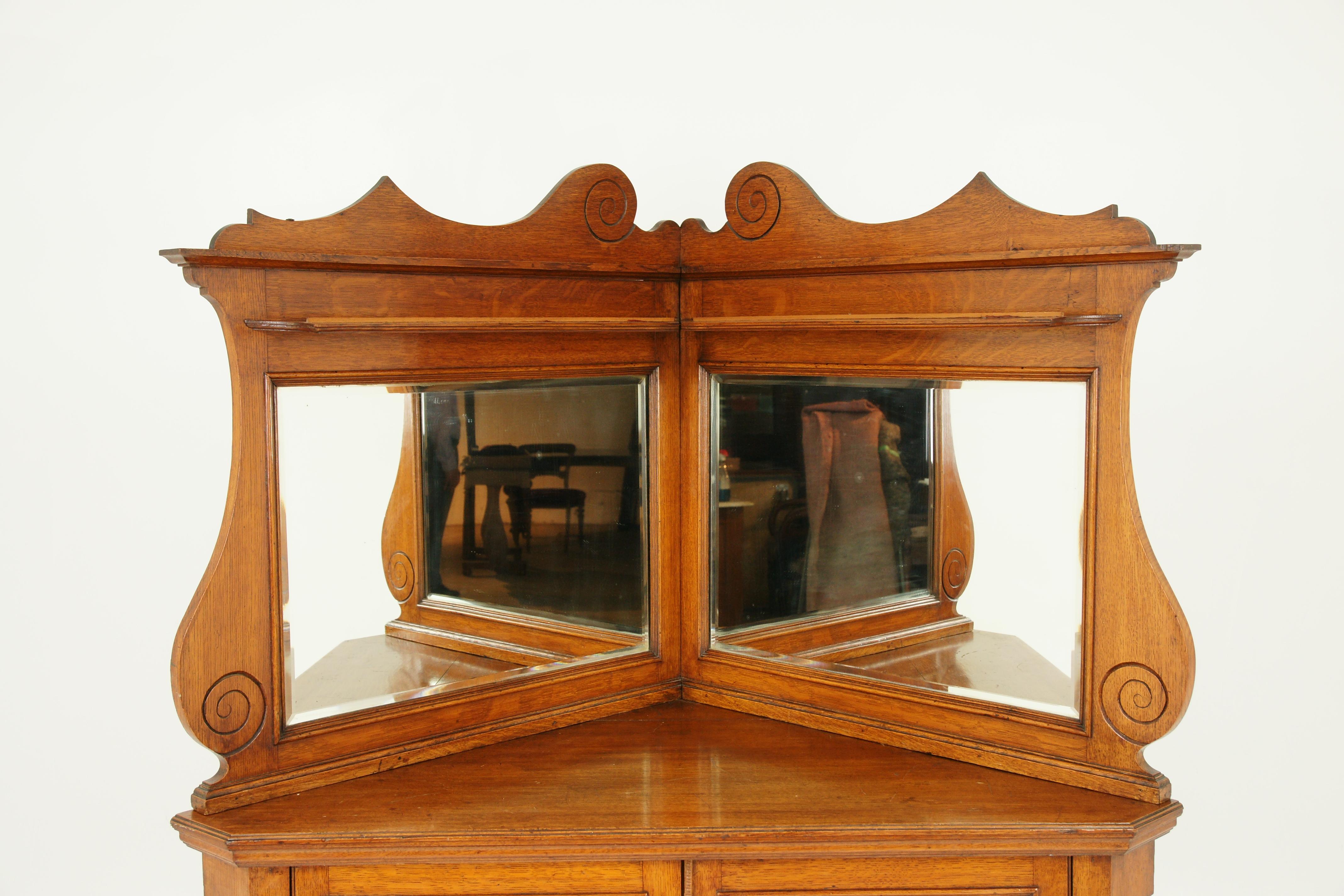 Grande armoire d'angle en chêne, armoire à miroir, vitrine, meuble d'entrée, Ecosse 1900, meubles anciens, H050

Écosse, 1900
Chêne massif avec finition d'origine
Fronton façonné au sommet
Etagère avec porte-assiettes en dessous
Paire de miroirs