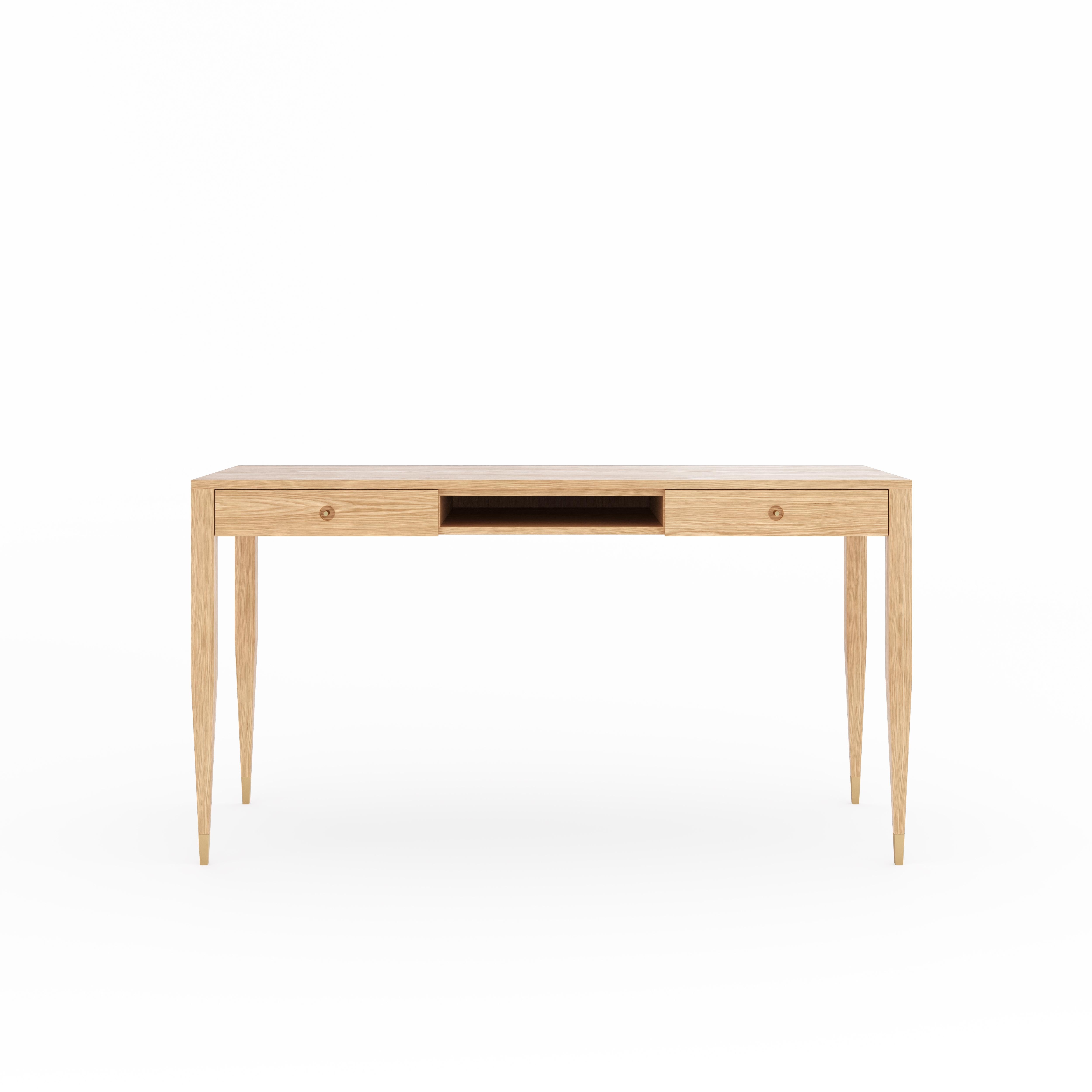 Large oak desk in mid-century style with two drawers, shelf and brass handles. The tapered legs are finished with brass plated aluminum feet. Desk made of solid oak wood and wood covered with natural oak veneer. Other wood on request. Perfect as