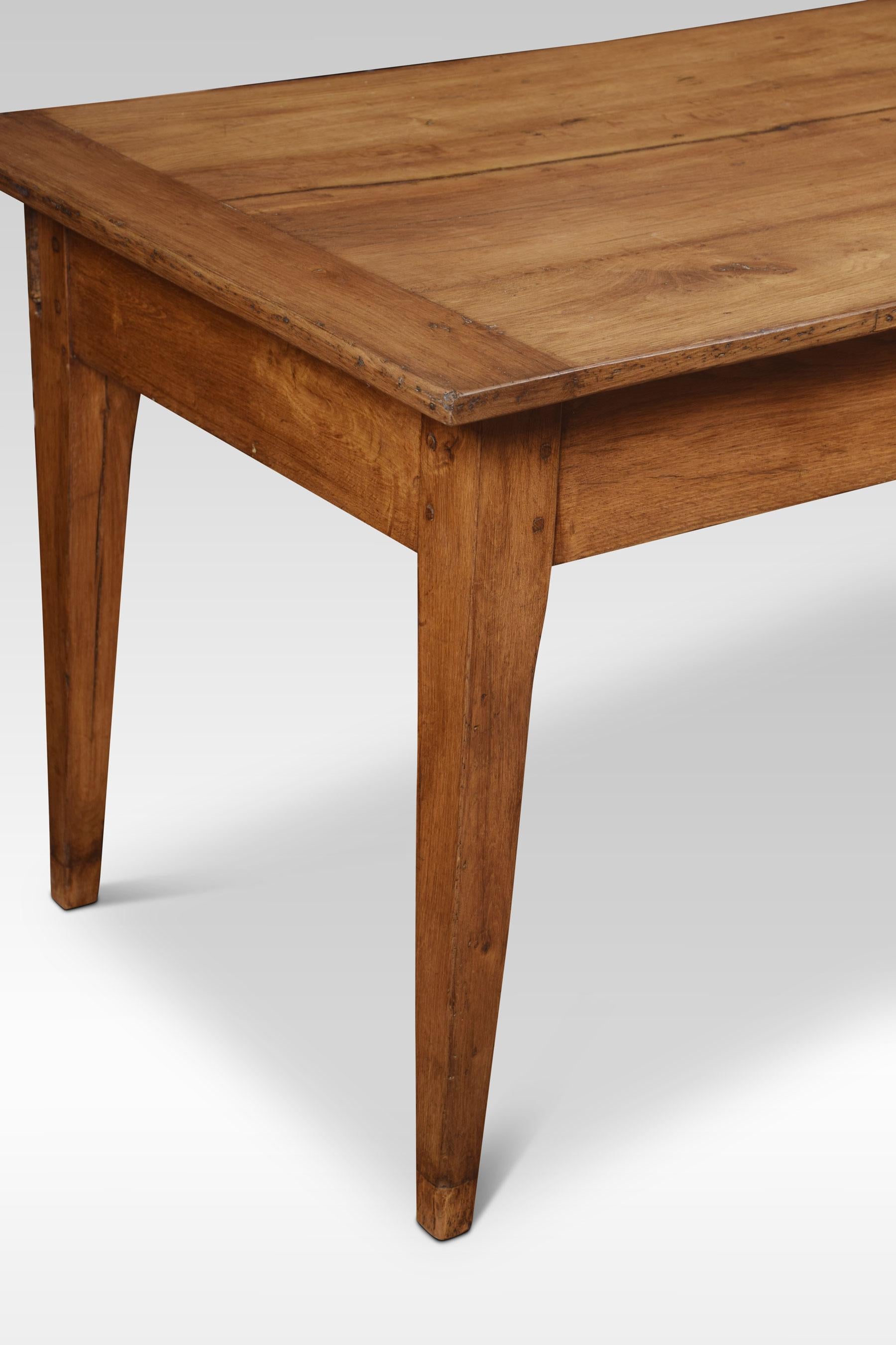 A large oak farmhouse table, the rectangular plank top over a central frieze draw flanked by unusual sliding cupboards. Raised up on slender tapered legs.
Dimensions:
Height 31 inches
Width 94 inches
Depth 32.5 inches.