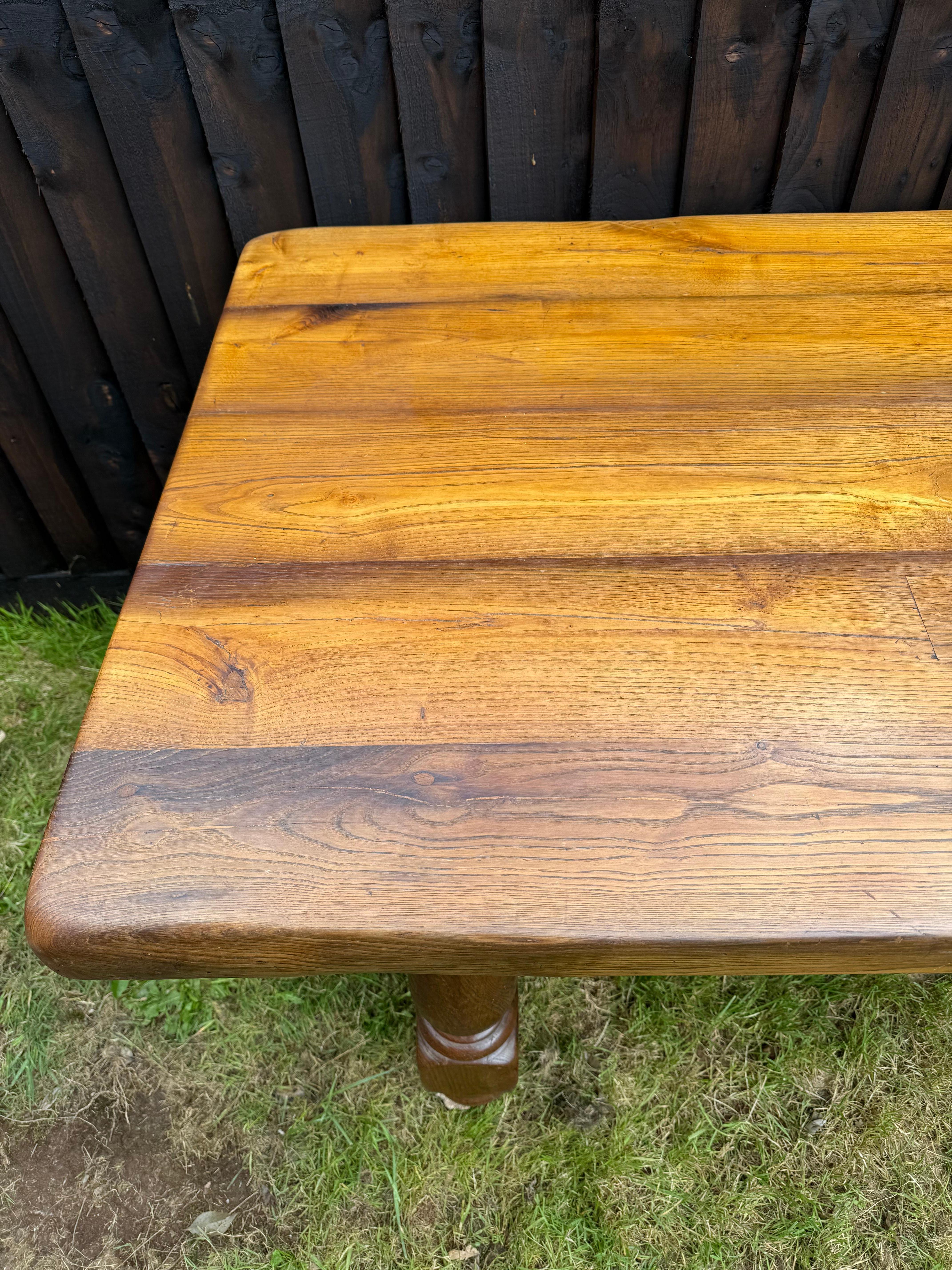 Early 20th century oak refectory table , the substantial top standing on turned legs / H stretcher 
Dating to around the 1920’s  this table will seat 8 people 
The top can come off for ease of transportation/ delivery 
Height 77 cms 
Width 85 cms
