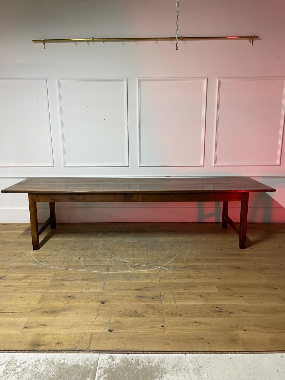 Mid 19th century French farm house table, dating to around the 1850’s. Constructed from solid oak, single drawer to either end, this table will seat twelve people .This piece has been through our workshop been cleaned and polished.
The legs have