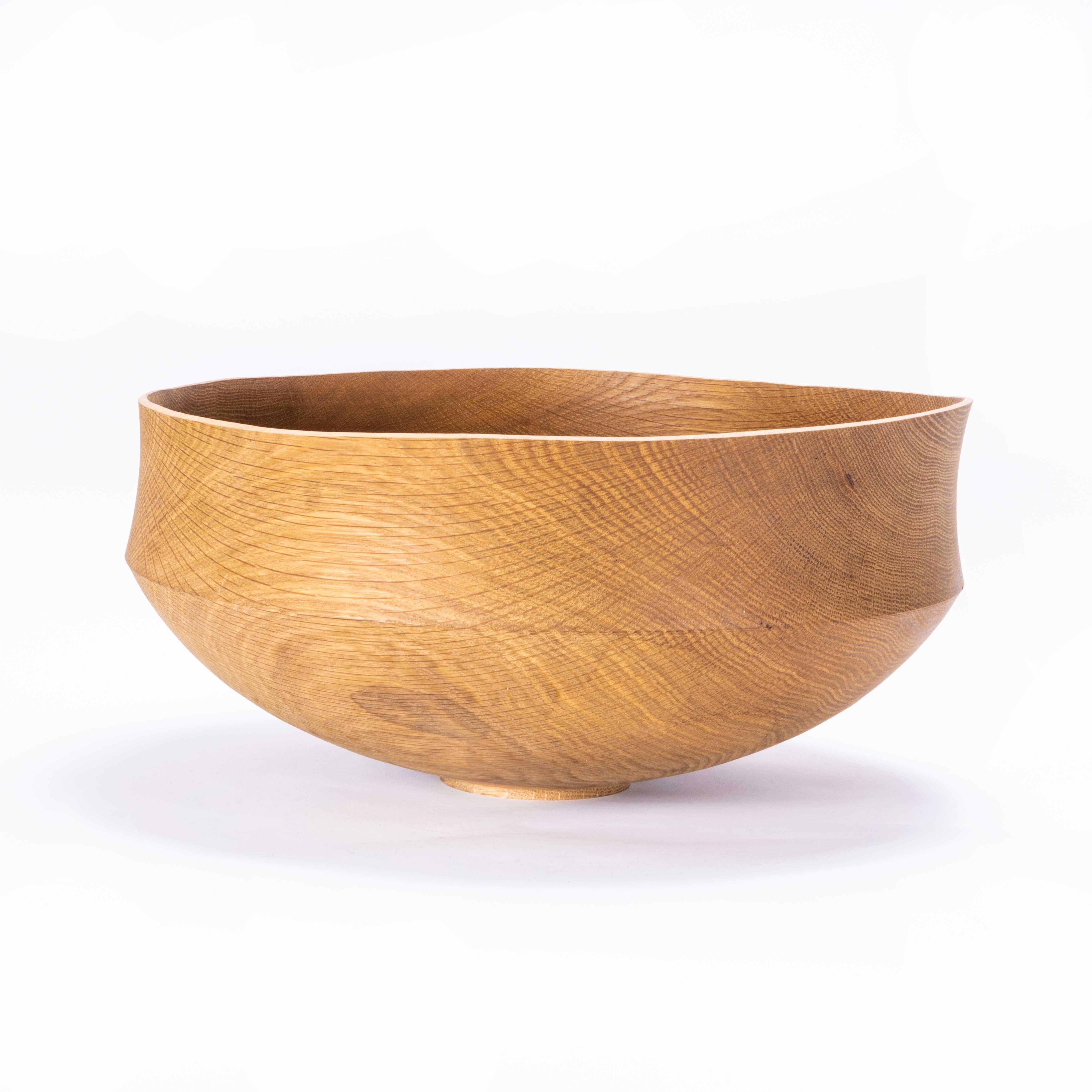 Large Oak Hand Turned Bowl - Tyler & Tara. 

Tyler and Tara are our friends in Knoxville Tennessee, they are contemporary wood turners, sourcing wood locally and hand selecting each piece for turning. This bowl is a unique piece made for us, it is