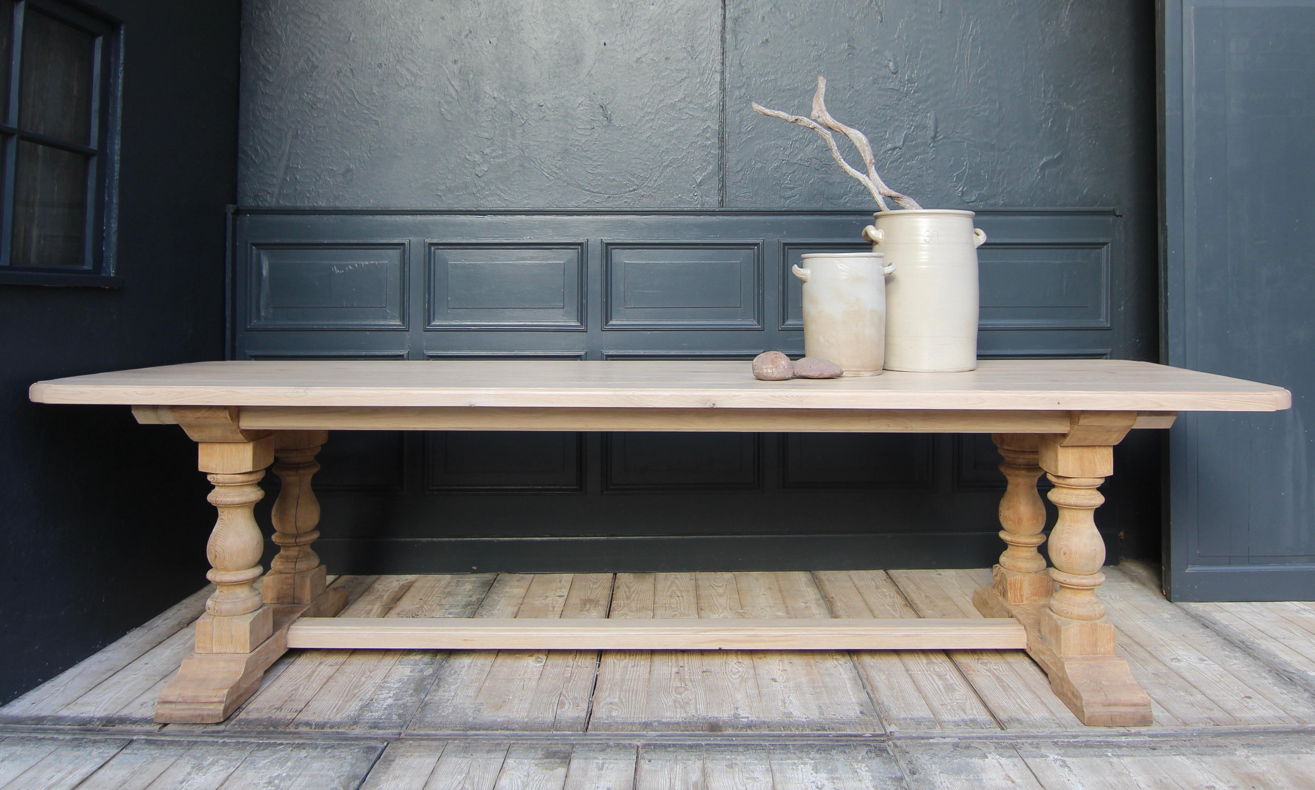 Large, light-coloured dining table newly made from old oak using original table legs. Ideal for 10-12 people.

The table was modelled in the style of antique refectory tables that have been found in monasteries since the Middle Ages.

Table frame on