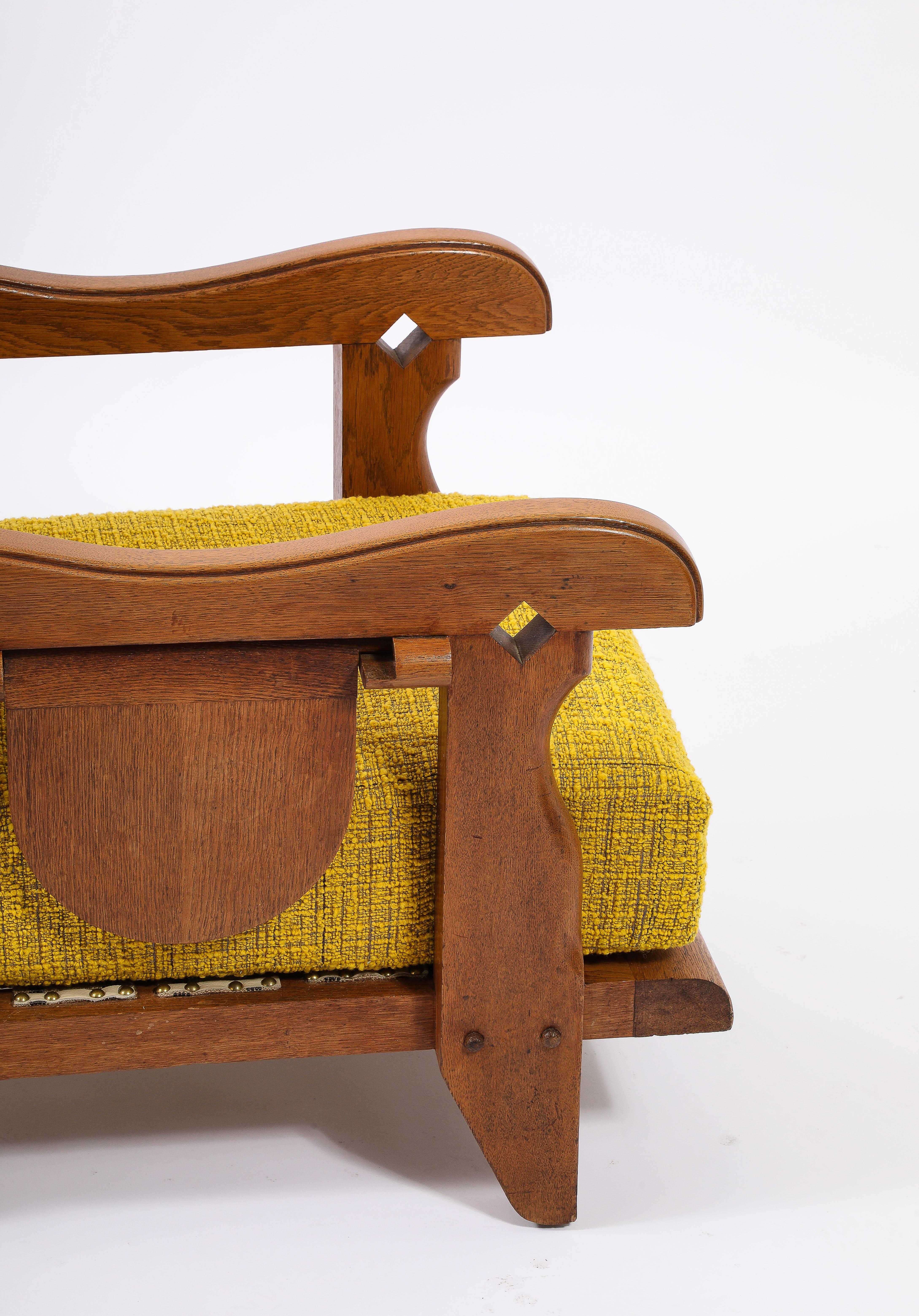 Hand-Carved Large Oak & Yellow Wool Armchair with side Shelf, France 1950's For Sale