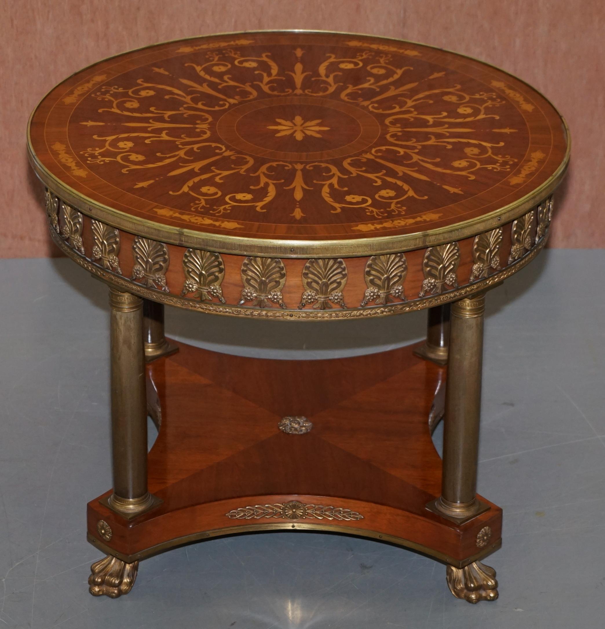 We are delighted to offer for sale they very well made beautifully inlaid large occasional side table with patinated bronze fixtures and fittings all over and Lion Hairy Paw feet

This is a large side table or small occasional centre table,