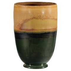 Large Ochre and Green Glazed Ceramic Planter with Tiered Earth-Tone Finish