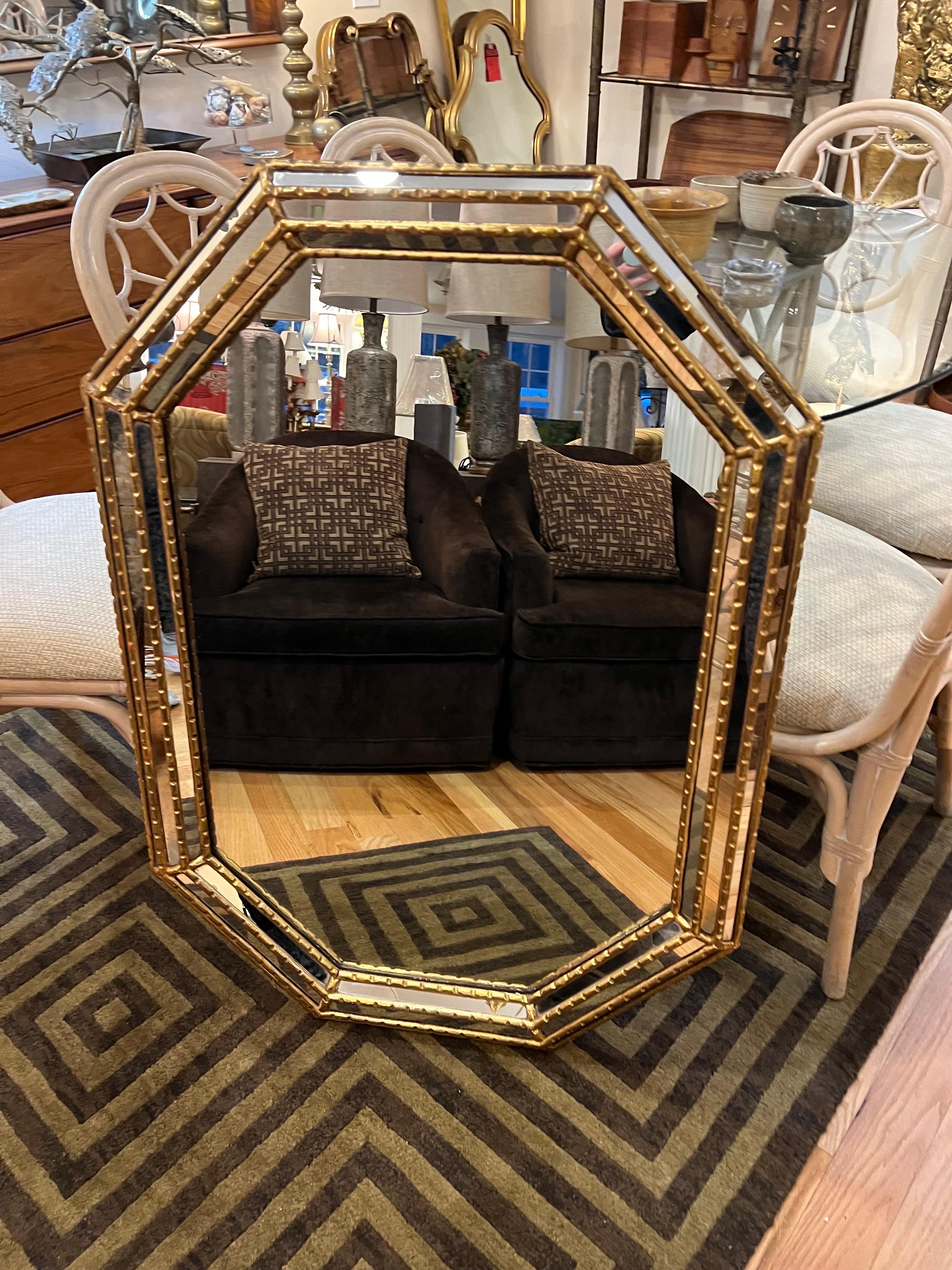 Labarge style octagonal gilt mirror. Thick triple Beveled edges and wide frame make up this beauty. Interesting octagonal shape. Perfect for a hallway or above a vanity.
Solid wood and very well made piece. Back when they made things right and they