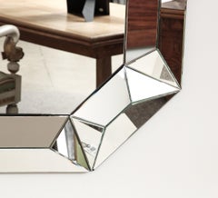 Large octagonal mirror with raised faceted Mirror Surround