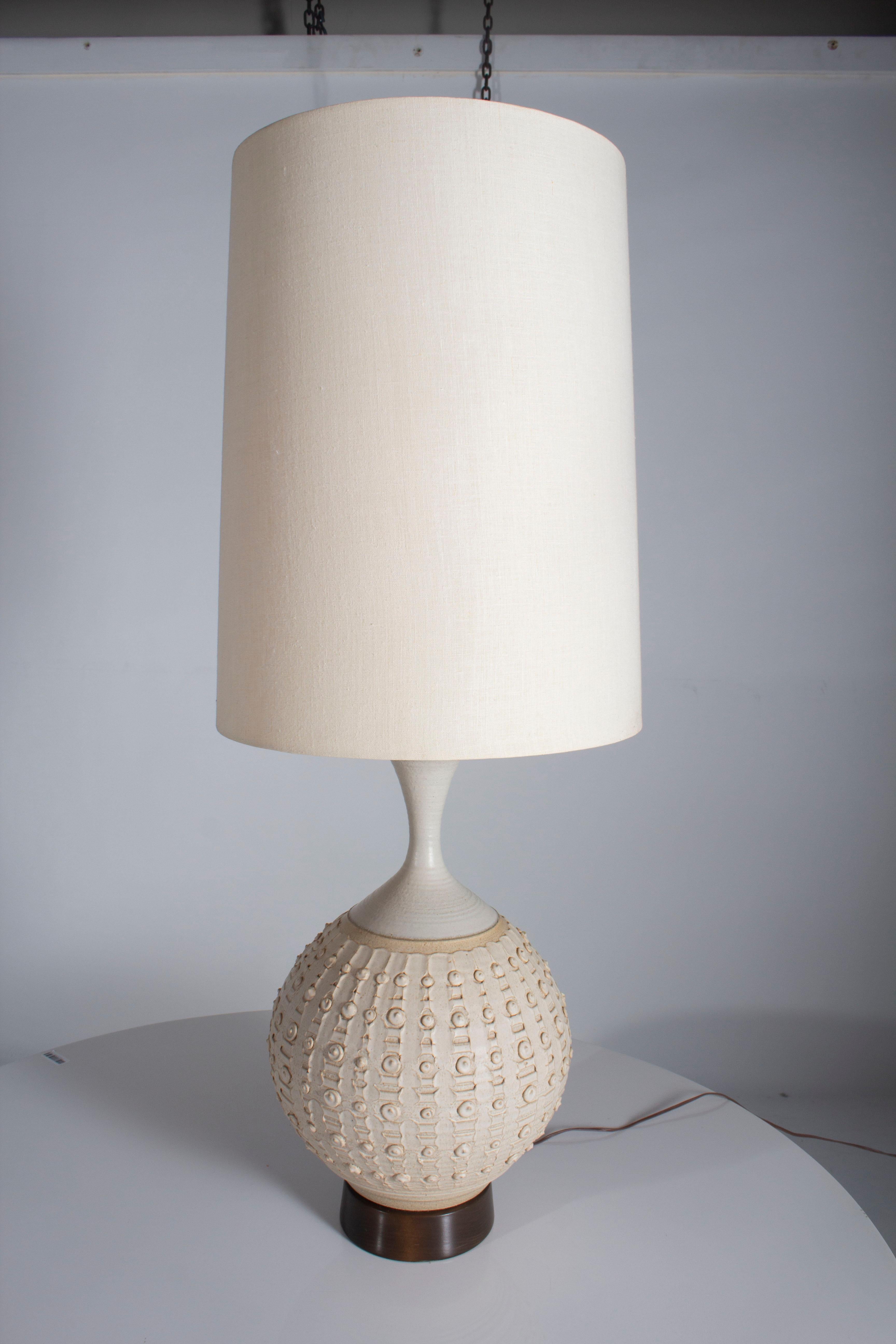 Monumental Bob Kenzie ceramic lamps with original shades.