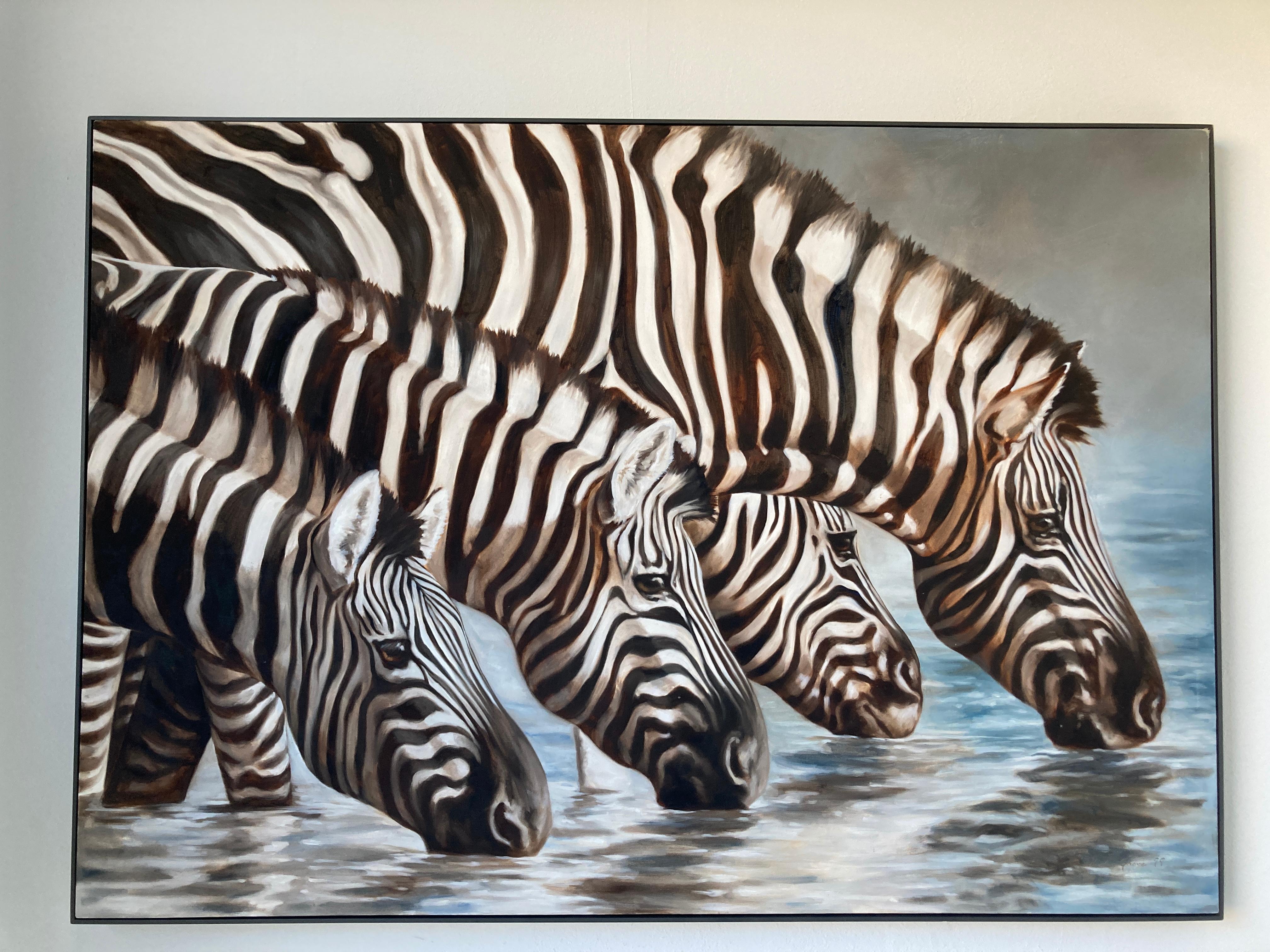 Sehr großes Öl auf Leinwand, Oasis, African Zebras von Kindrie Grove, kanadischer Künstler.
Großes Ölgemälde, das eine Gruppe von Zebras zeigt, die friedlich an einem Fluss in Afrika trinken.
Hergestellt im Jahr 1999.
Kindrie Grove Studios sind